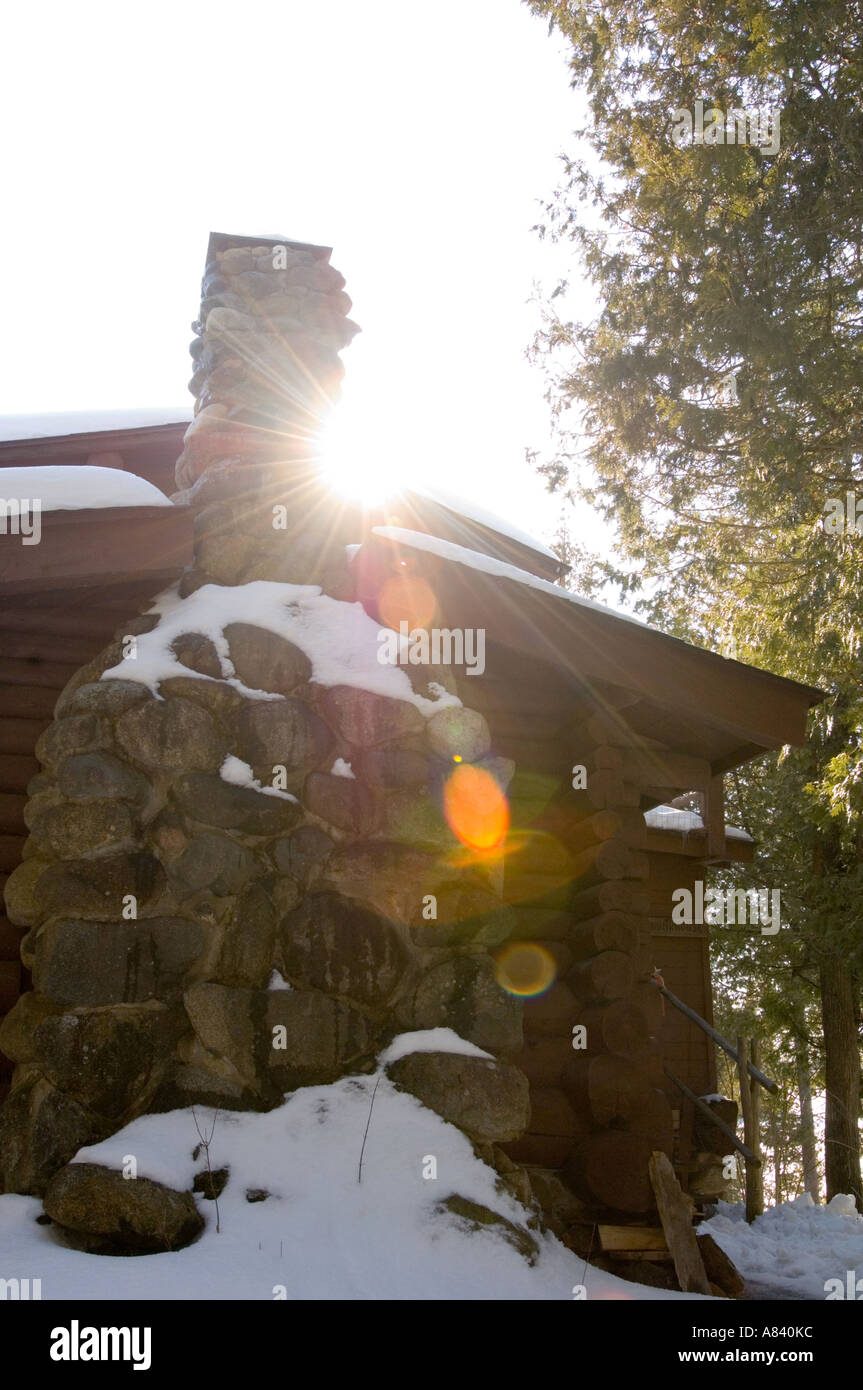 Setting sun behind Ridge Bunkhouse Snowshoe Country Lodge Isabella