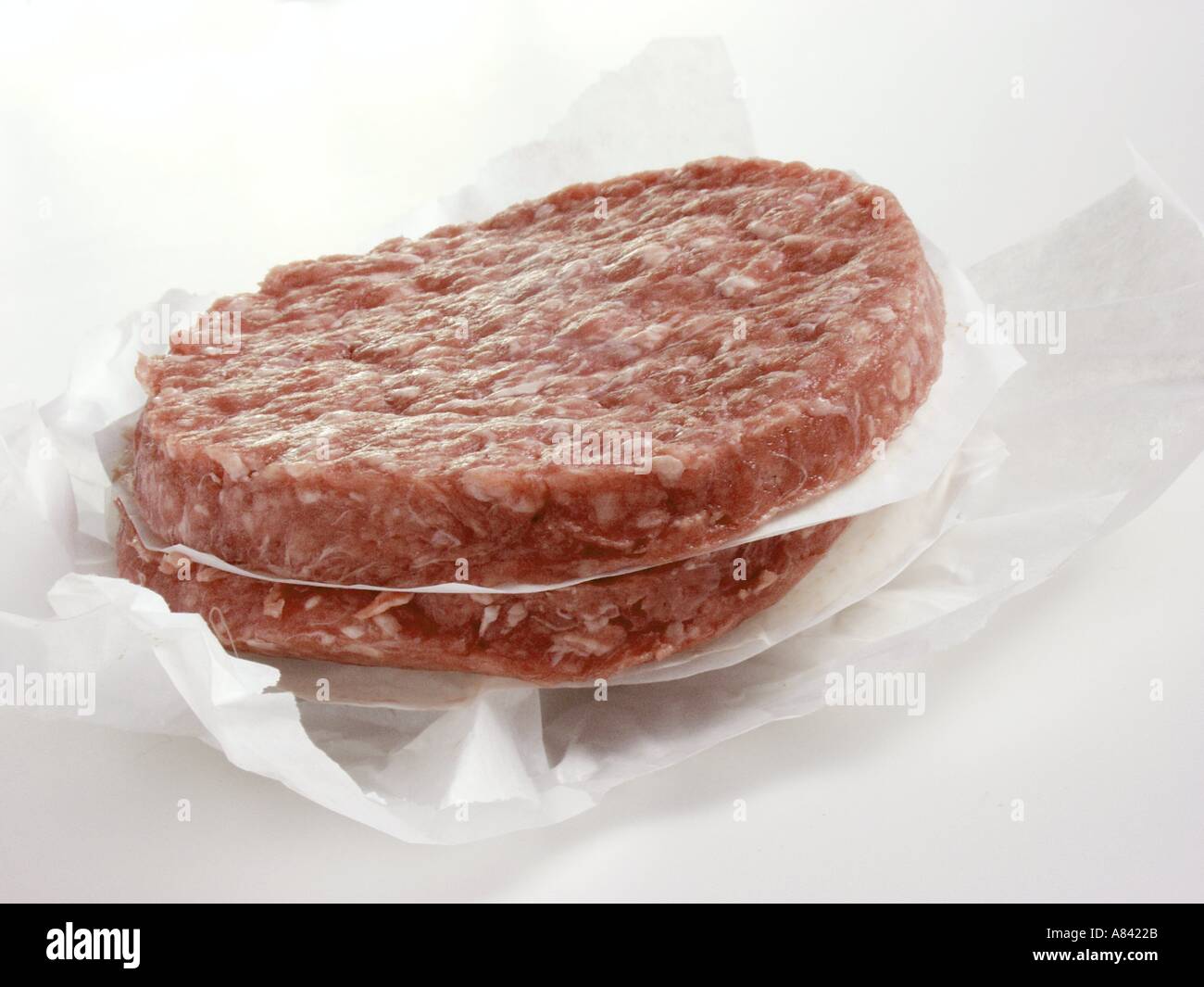 Two Hamburger Patties in Butcher s Paper Stock Photo Alamy