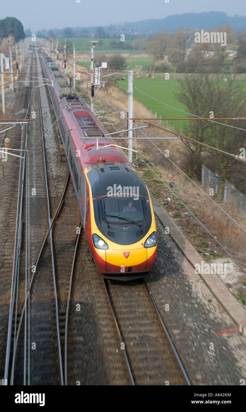 Virgin class 390 Pendolino train travelling through the british ...