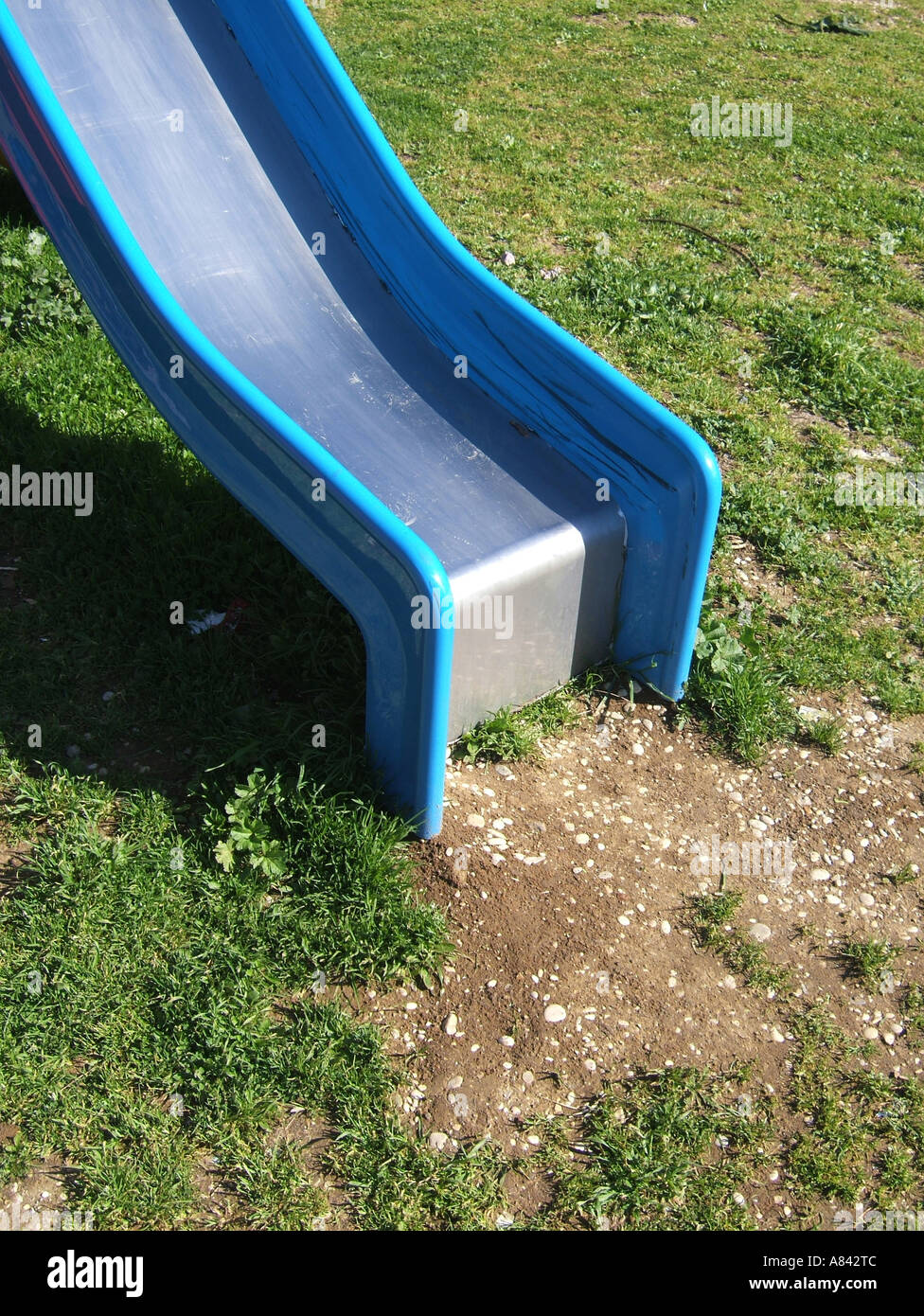 Slide And Ride In Run Down Urban Decay Playground Stock Photo Alamy