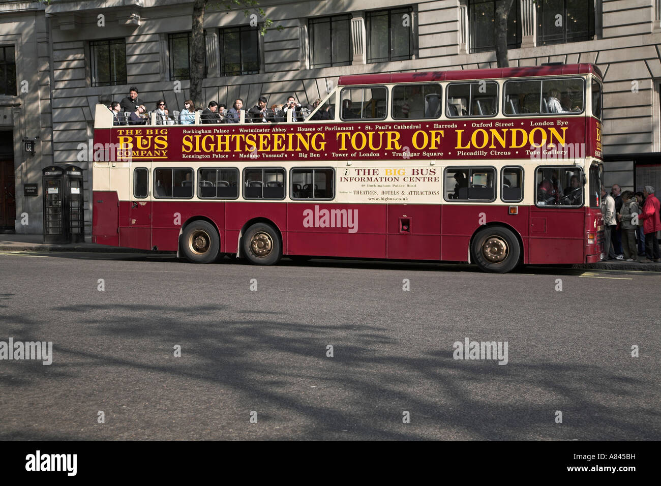 Open topped tour bus in central London, England Stock Photo