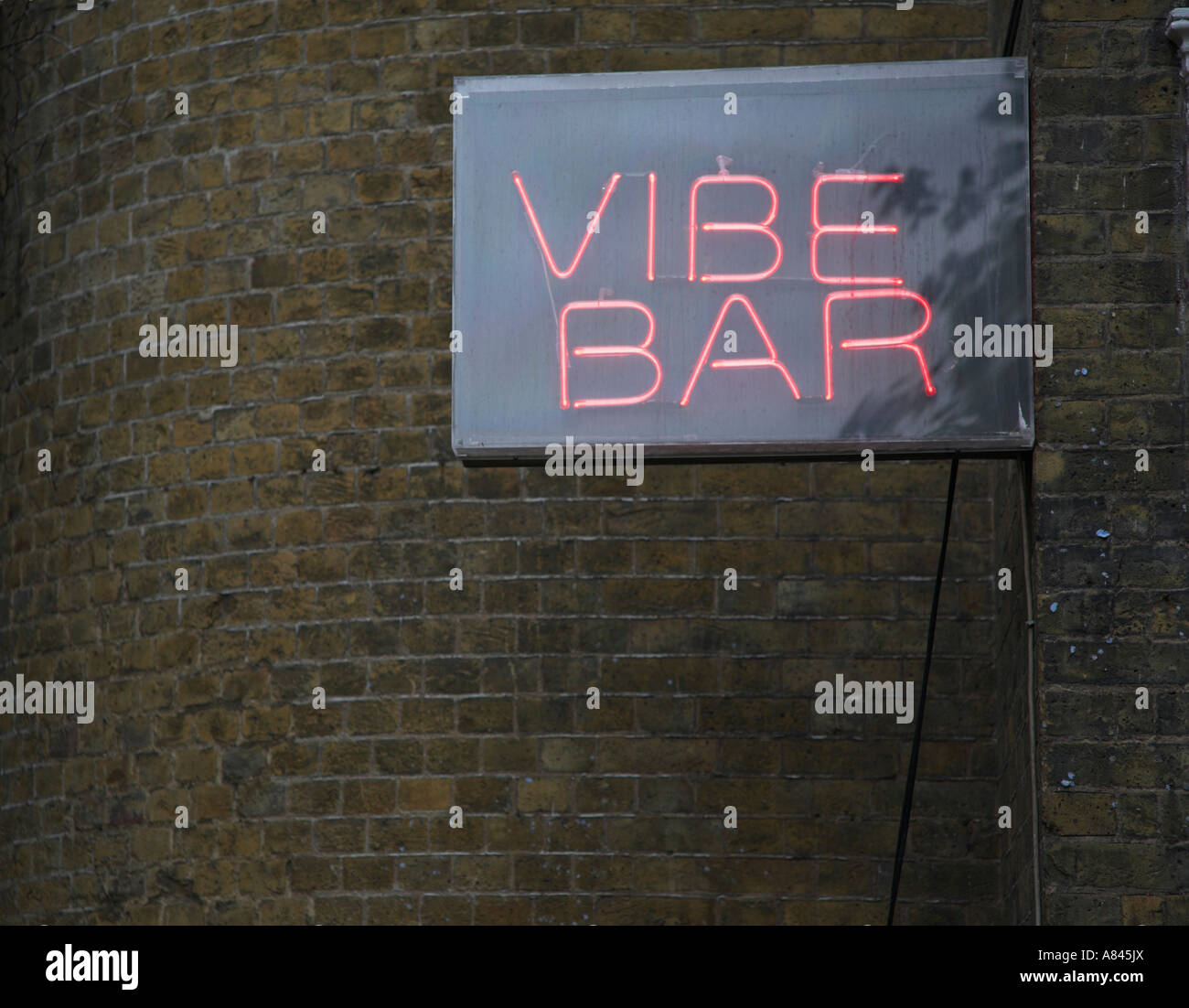 Vibe bar red neon sign Brick Lane, East End, London, England Stock Photo