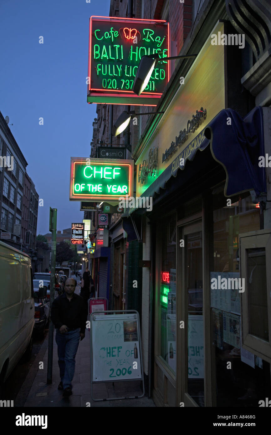 Balti House curry houses neon sign at night Brick Lane, London East End, England Stock Photo