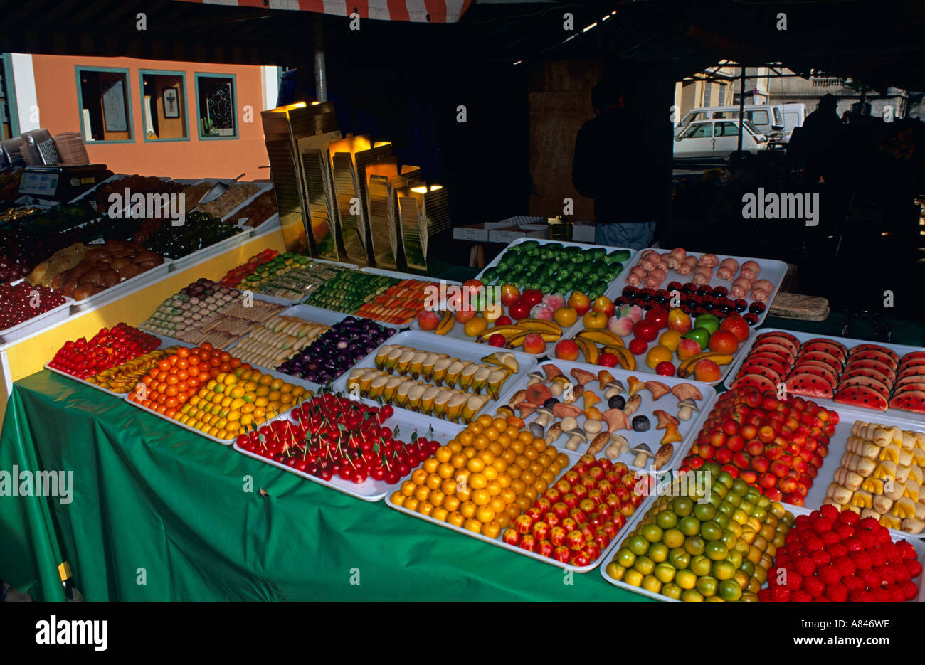 France. South Provence. Nice. Scene from the old market.  Couldn't be more colorful than this.  All sweets, artificial, marzipan Stock Photo