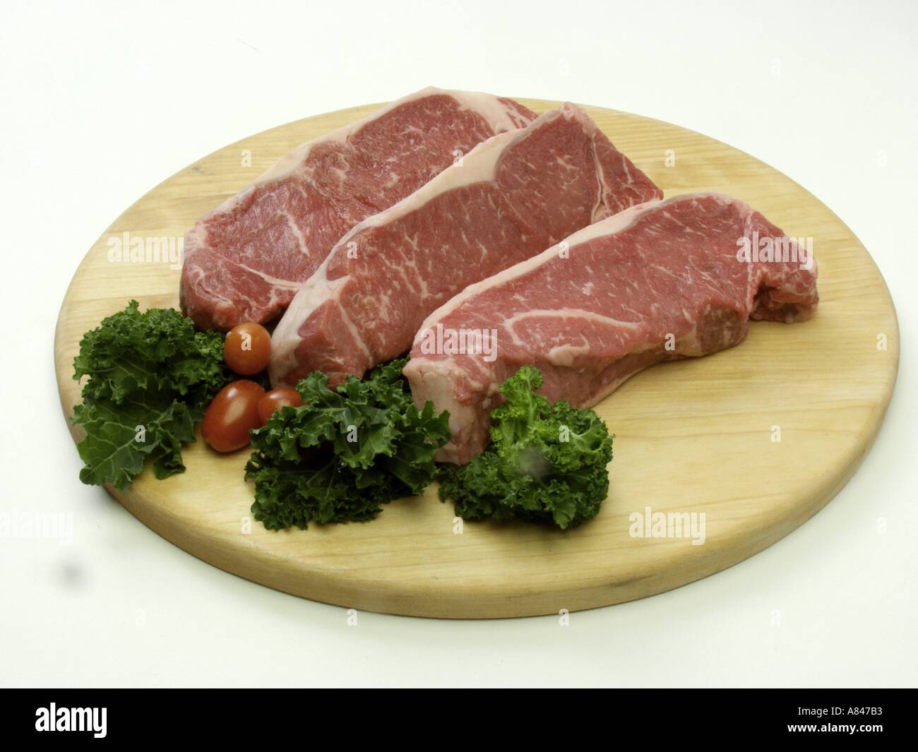 Three Top Loin Steaks Stock Photo Alamy