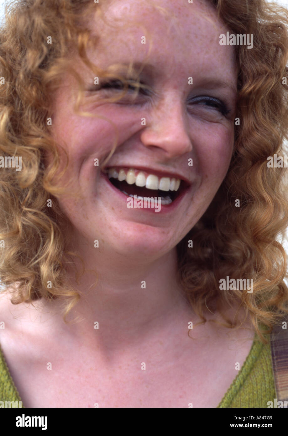 Woman very happy laughing red hair hi-res stock photography and images ...
