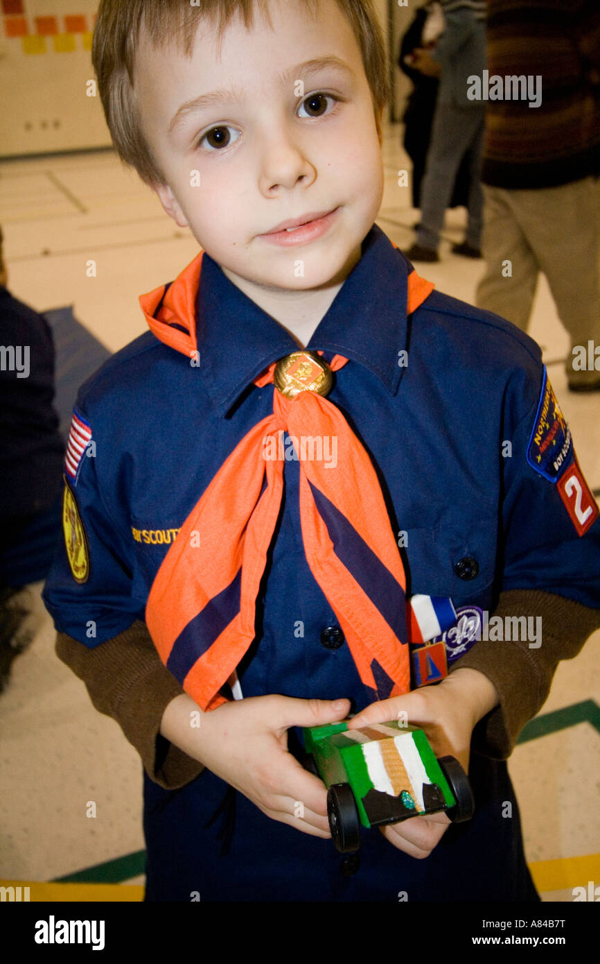 Cub Scout holding his racecar entry into the Pinewood Derby. Horace Mann Elementary School 'St Paul' Minnesota USA Stock Photo