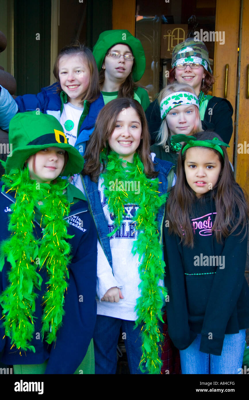 St Patrick's Day Parade Girls age 8 thru 13 in their Irish boas and attire. St Paul Minnesota USA Stock Photo