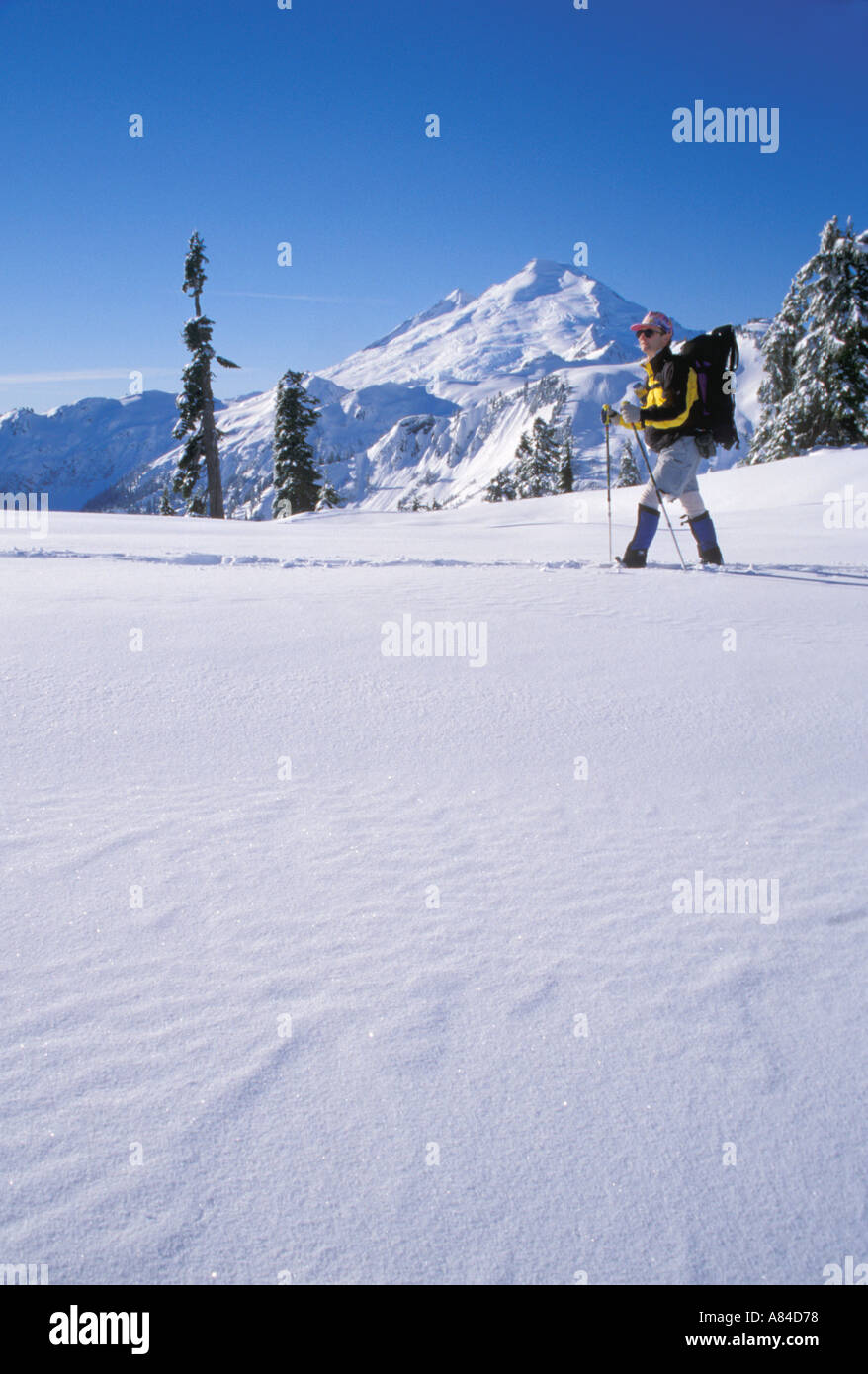 Man snowshoeing in mountains Washington Cascade Mountains Stock Photo