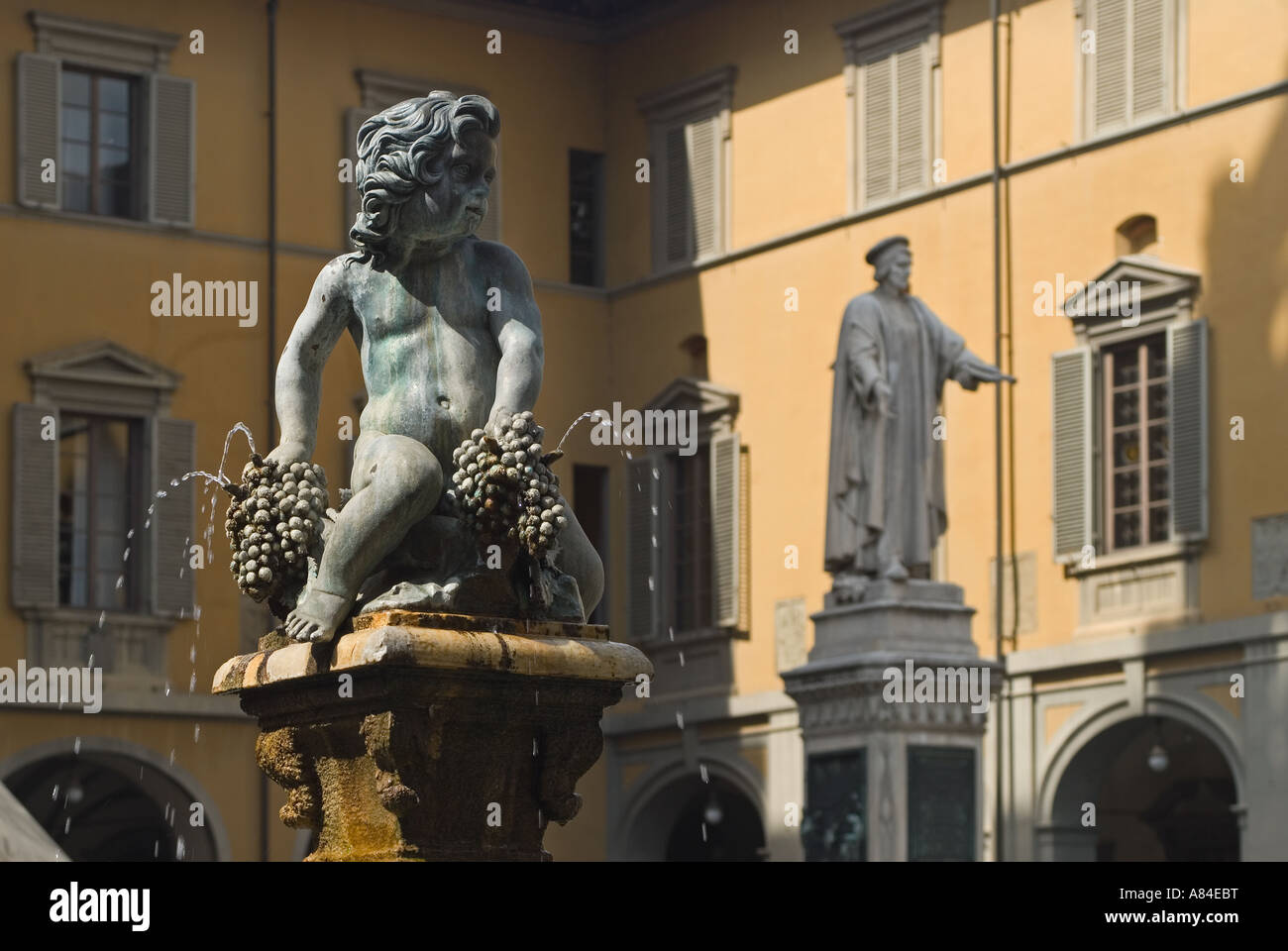 Prato, Tuscany, Italy. Bacchino Fountain and Statue in Piazza del Comune Stock Photo