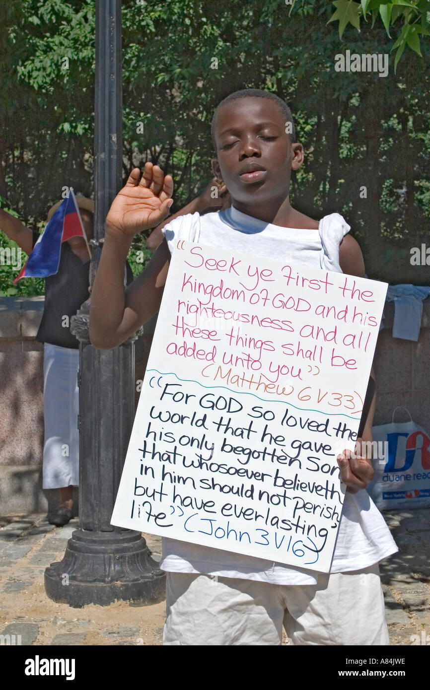 Young African American Christian at an outreach march in Brooklyn, NY. Stock Photo