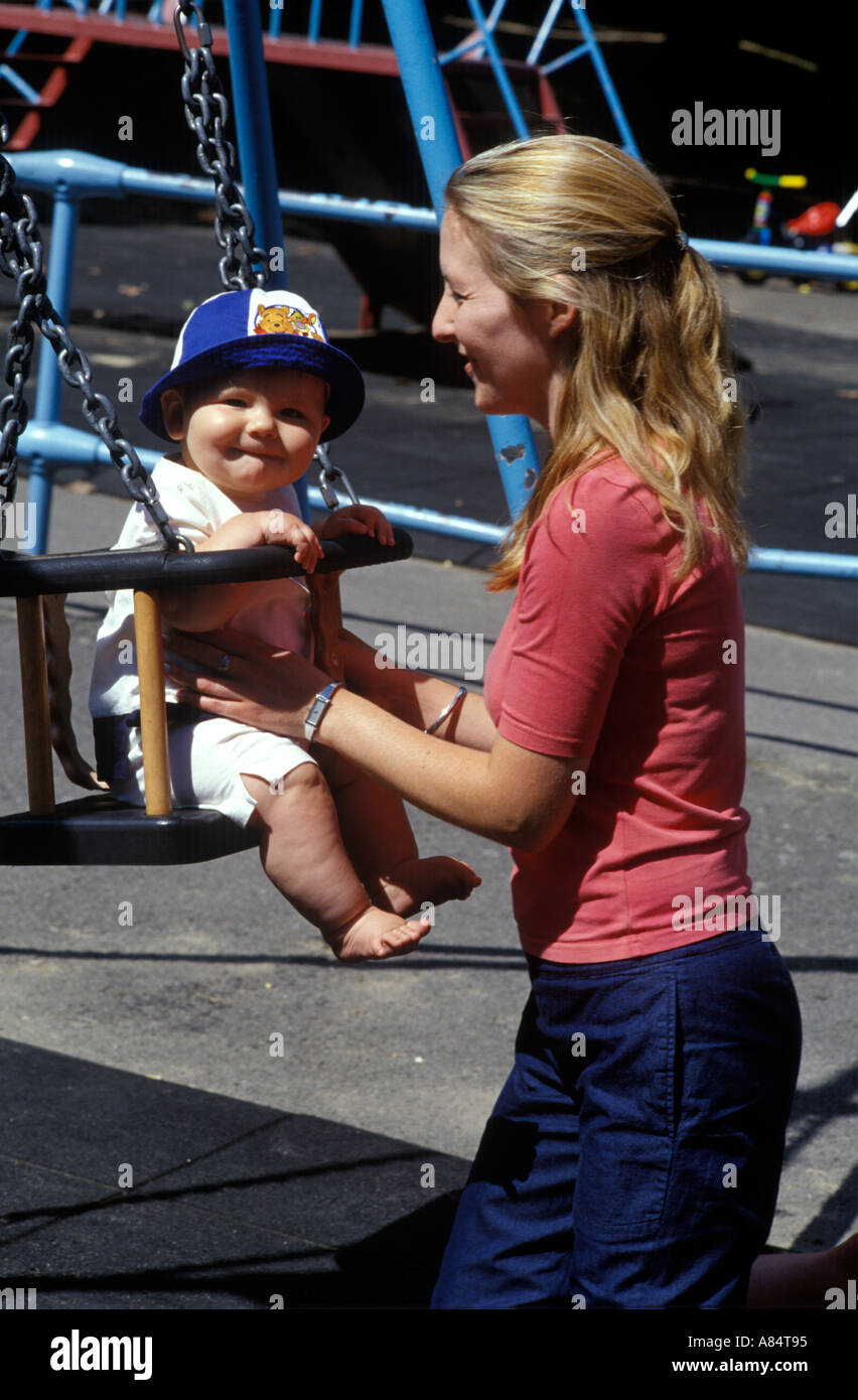 mother and baby in playground Stock Photo - Alamy