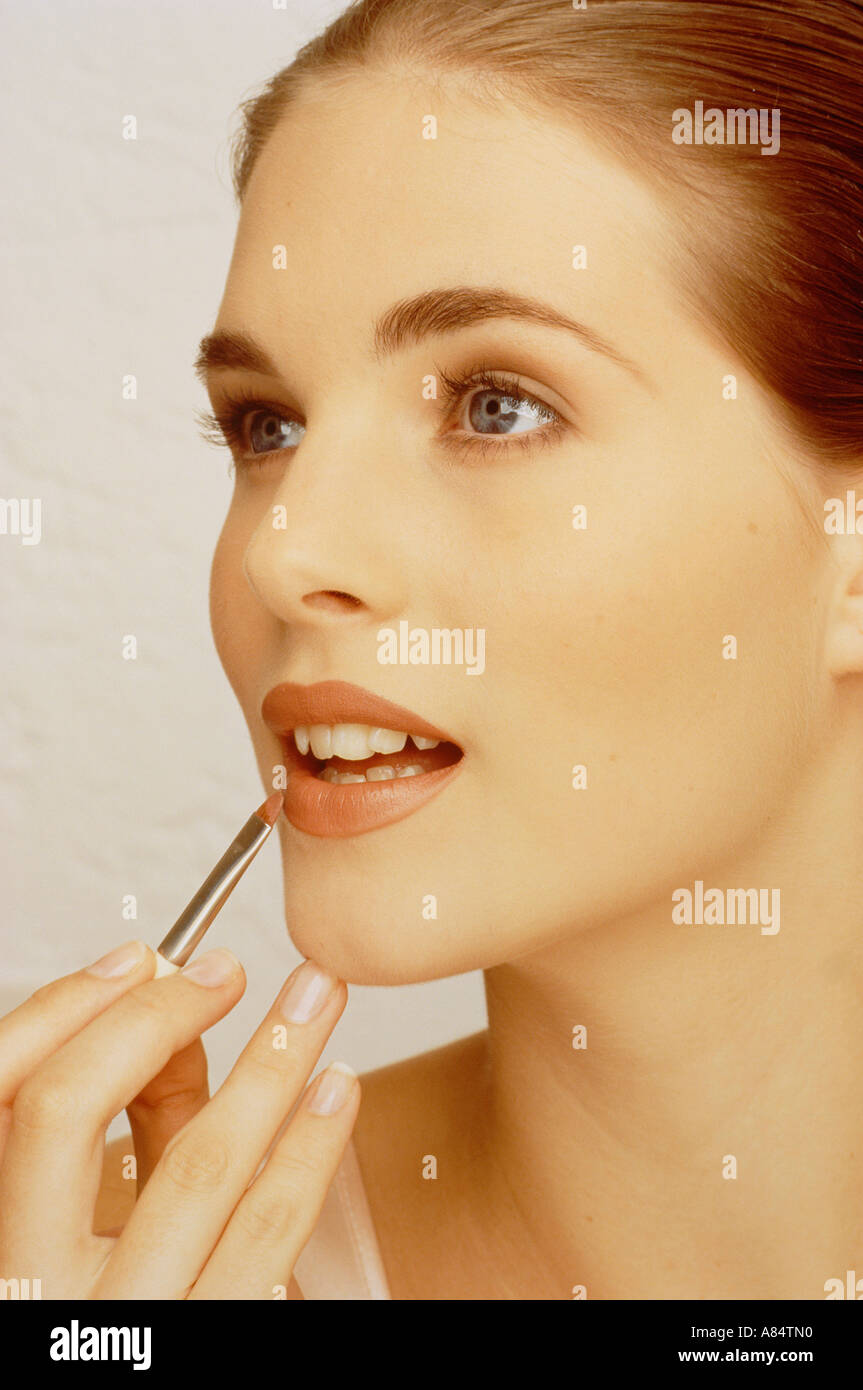 Young beautiful perfect model applying hi-res stock photography and ...