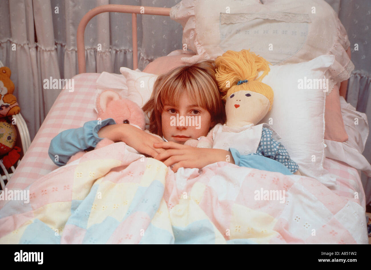 Tucked up in bed hi-res stock photography and images - Alamy