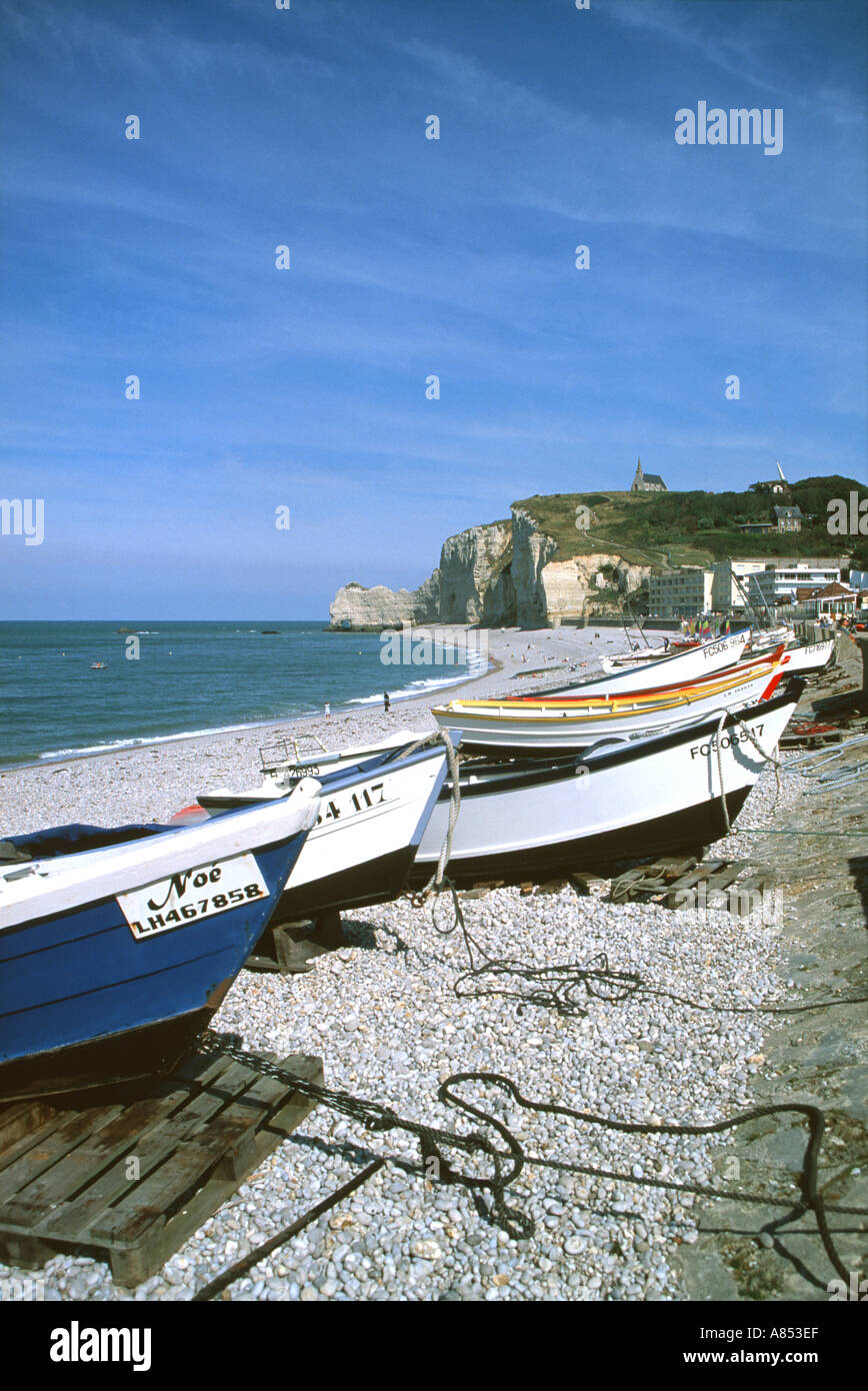 Fishing boats pulled up onto the beach at Étretat Stock Photo - Alamy