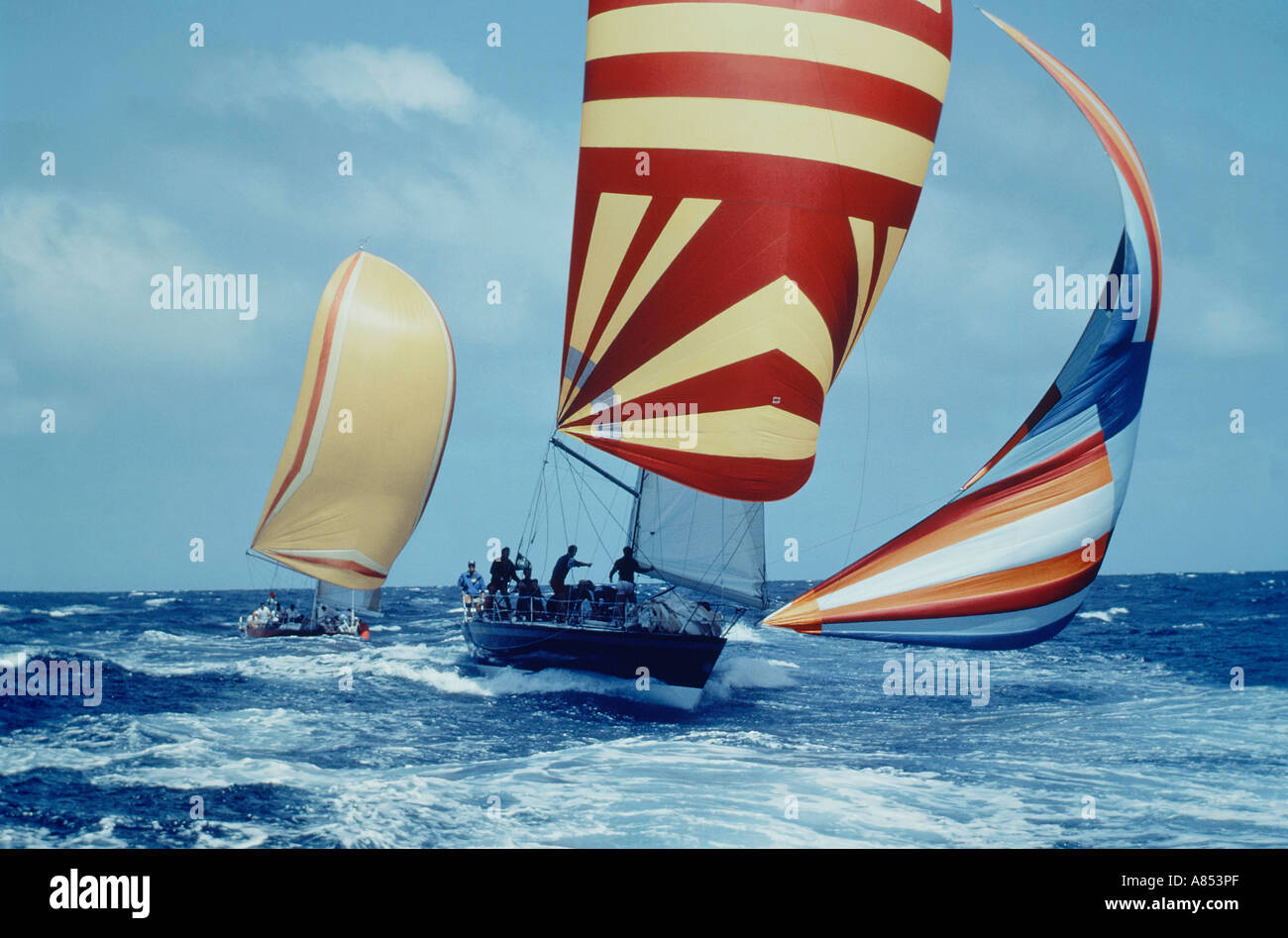 Yacht racing. Yachts with spinnaker sails. Stock Photo