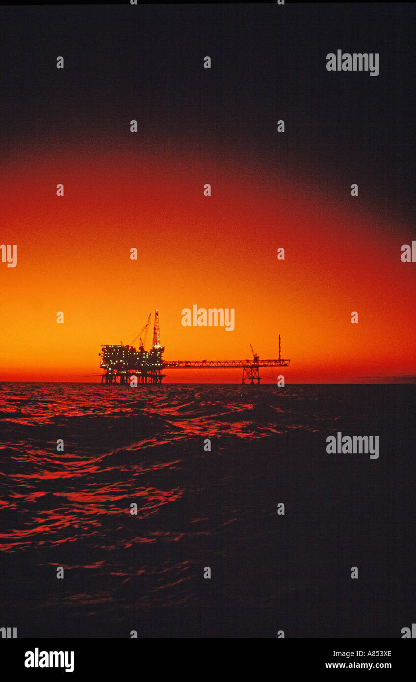North Rankin A offshore oil rig in ocean sunset. Australia. Stock Photo