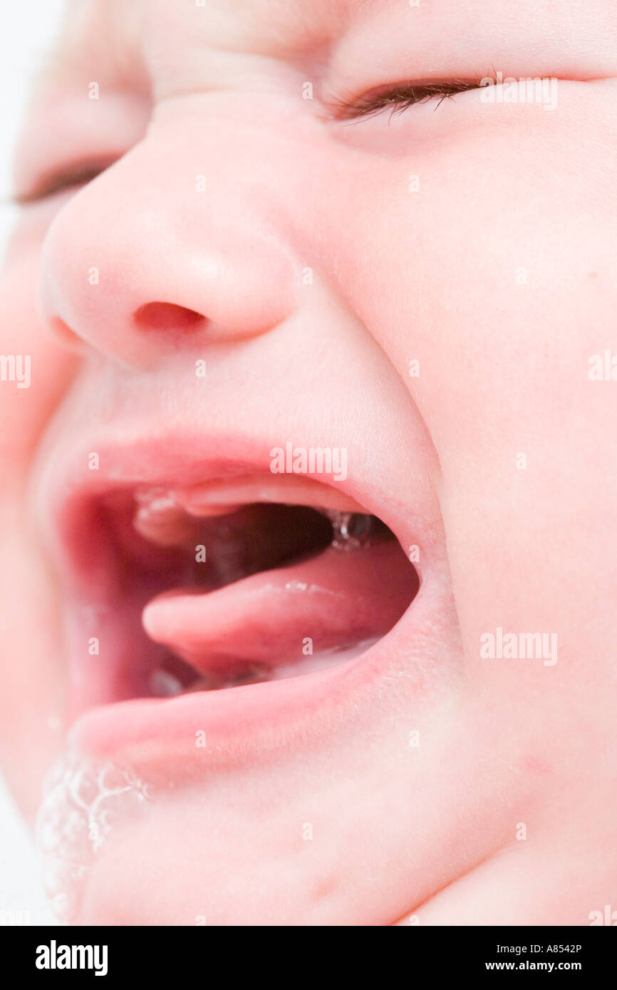 Baby Crying Beacuse of Teeth Stock Photo
