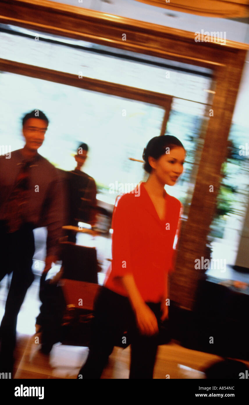 Staff greeting guests in hotel hi-res stock photography and images - Alamy