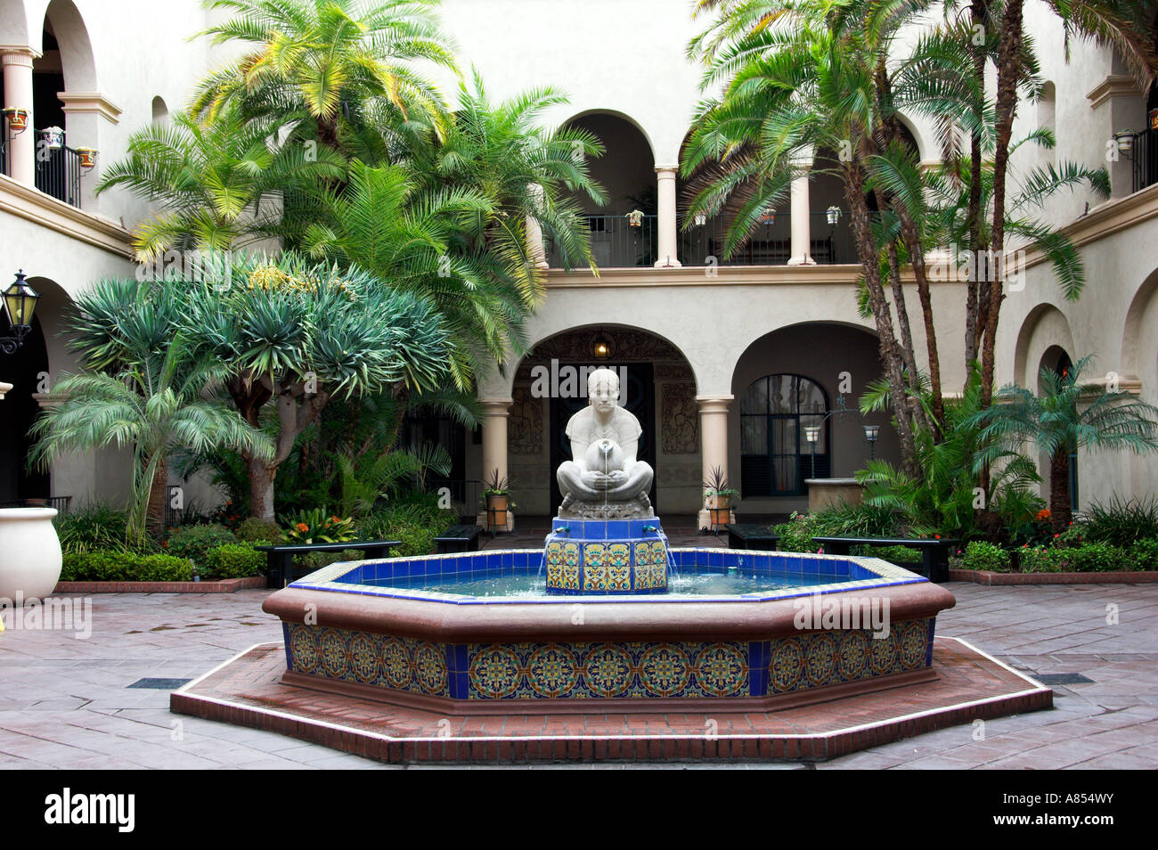 Interior courtyard with a decorative water fountain at the Stock Photo