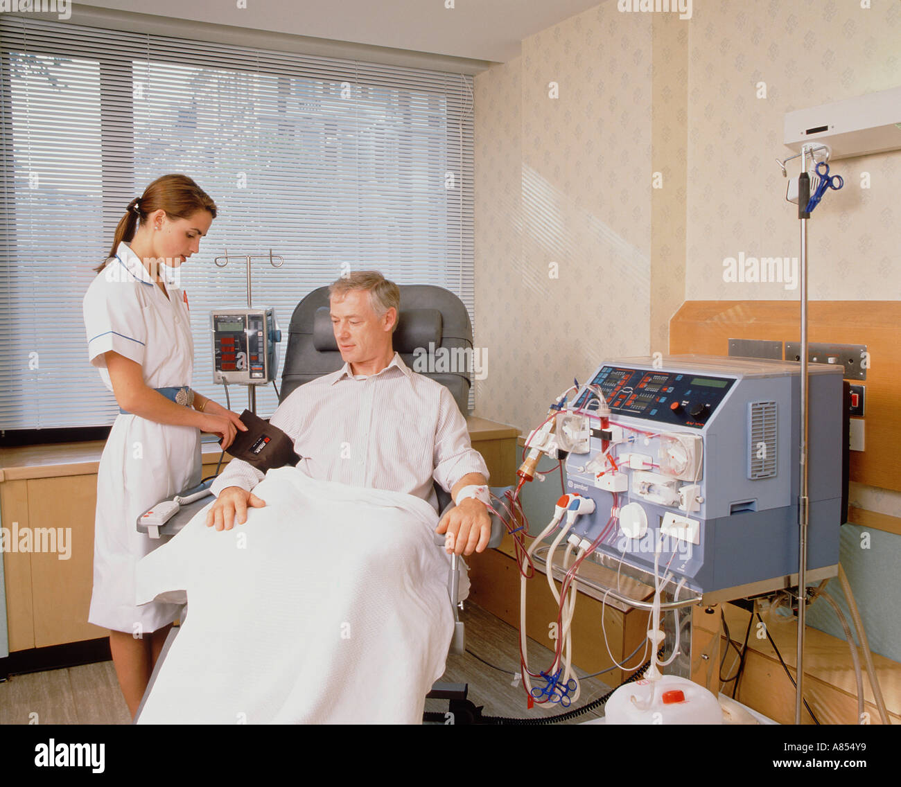 hospital-nurse-with-male-patient-undergoing-renal-dialysis-stock-photo-alamy