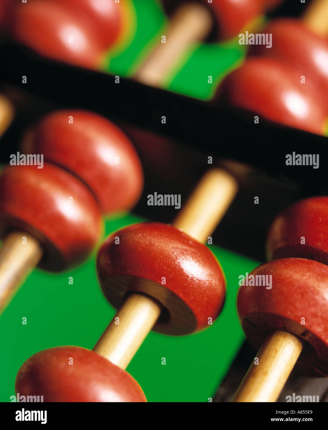 close up of abacus on green background Stock Photo