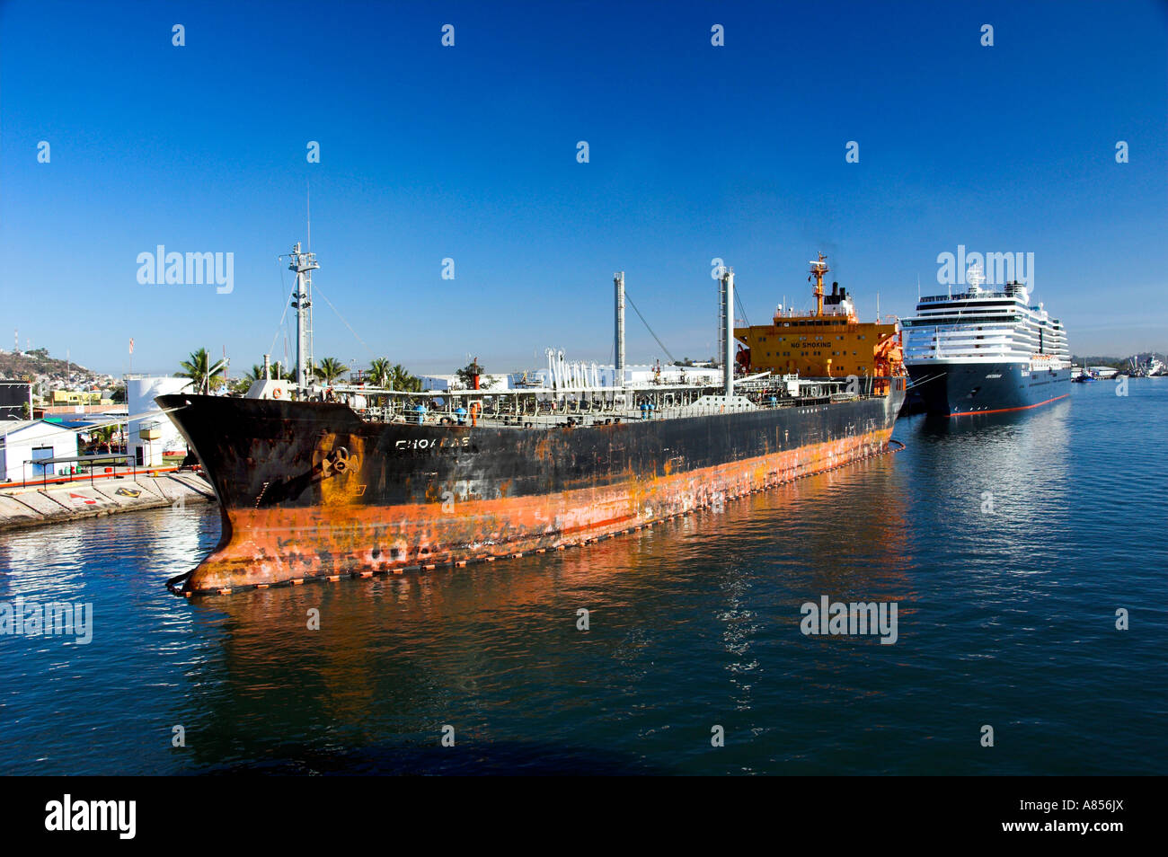 Cargo and cruise ships in the port of Mazatlan Mexico Stock Photo