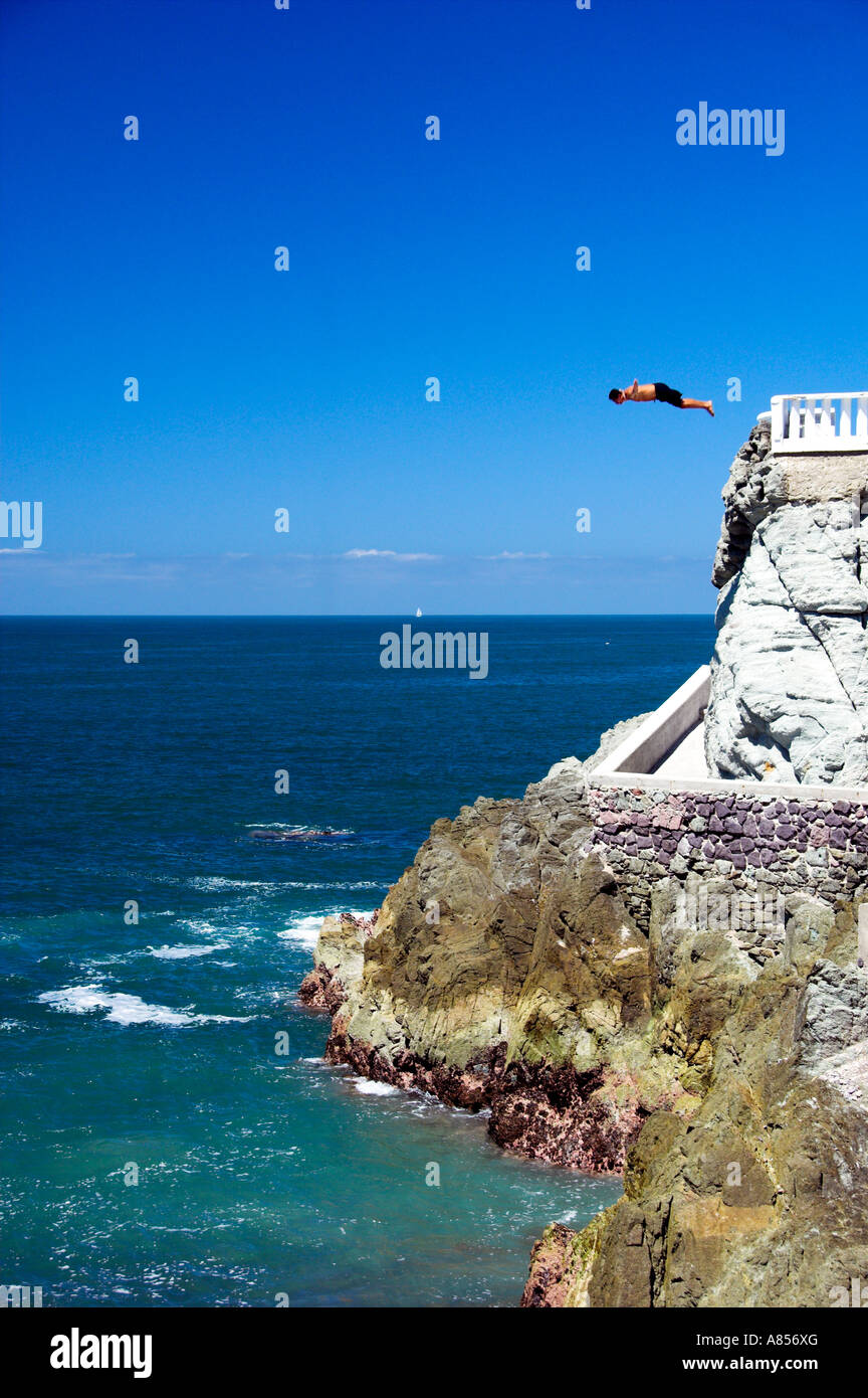 Cliff divers along the waterfront in Mazatlan Mexico Stock Photo