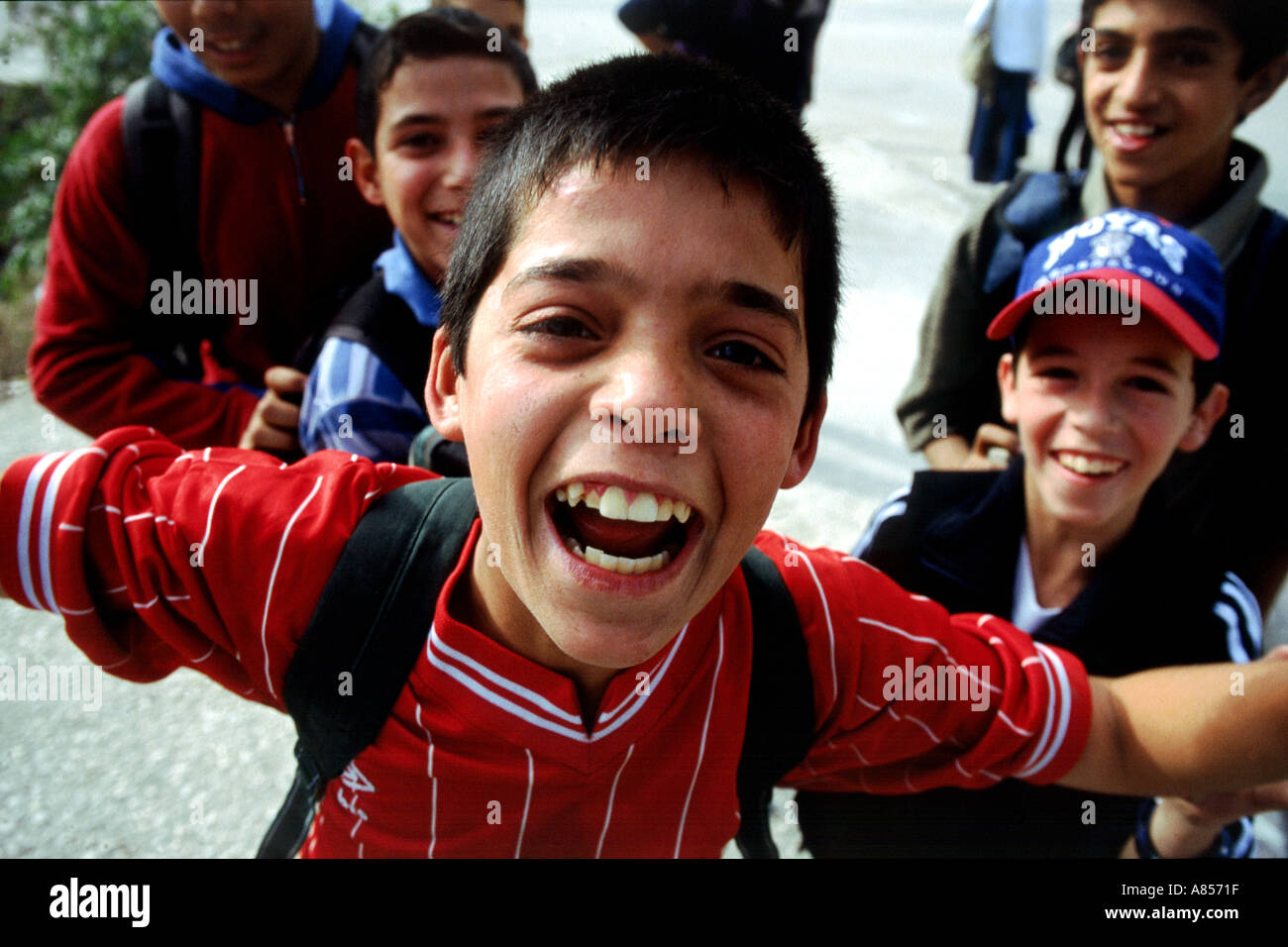 Happy children running about after the lifting of the curfew Nablus November 2002  Stock Photo