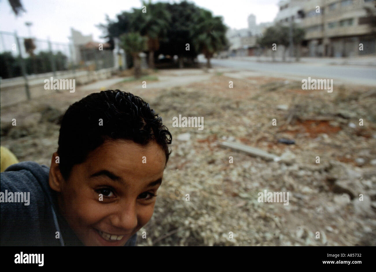A young boy escapes the aim of an Israeli sniper Nablus November 2002  Stock Photo