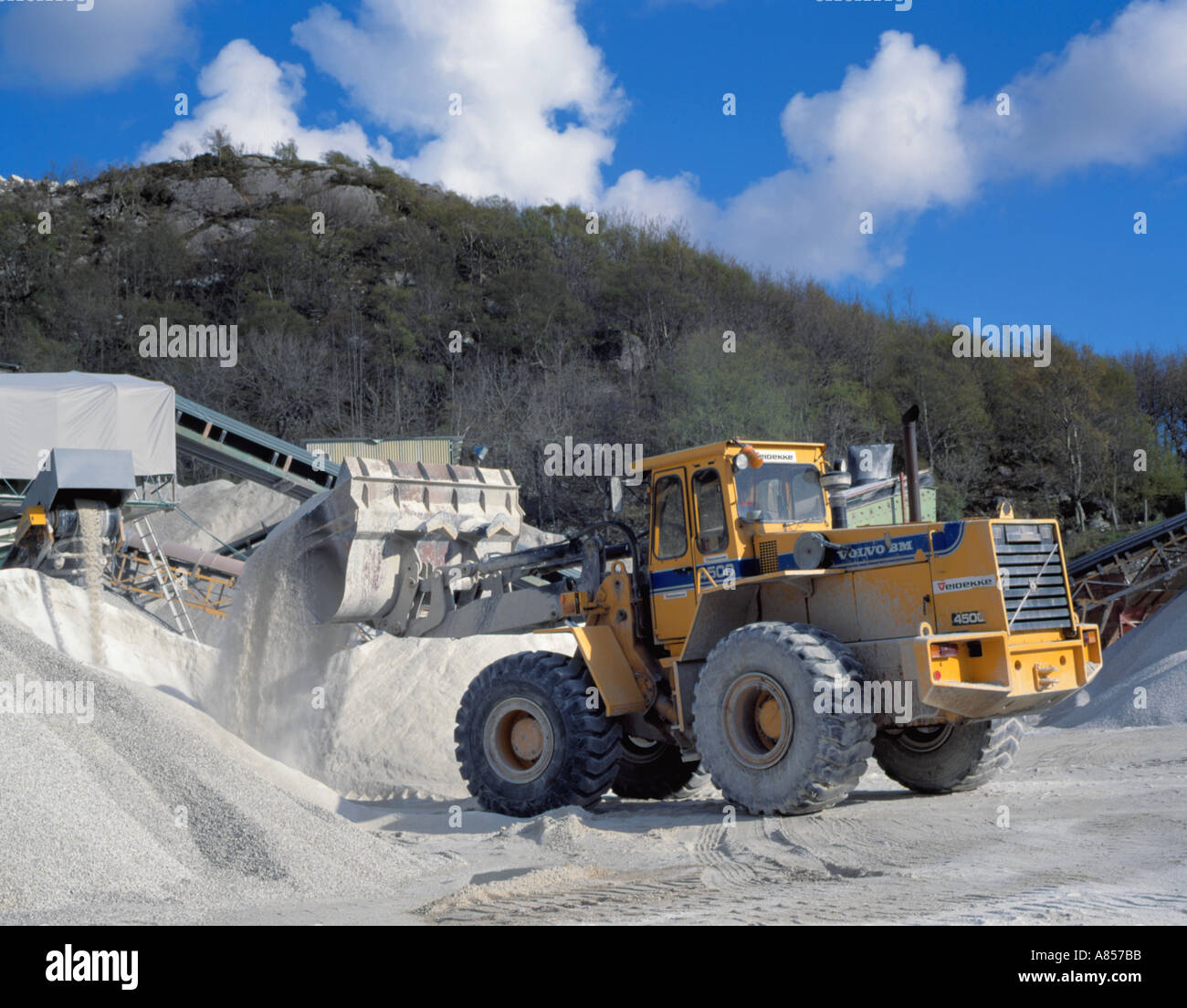 Volvo wheeled loader working in the talc quarry near Hegrestad, north of Egersund, Rogaland, Norway. Stock Photo