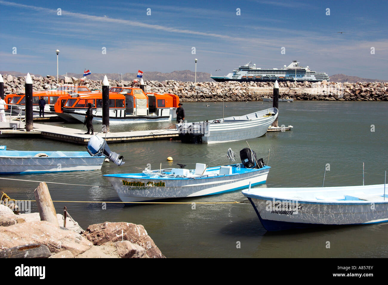 Colorful fishing boats and the Baja Sur port of Loreto Mexico Stock