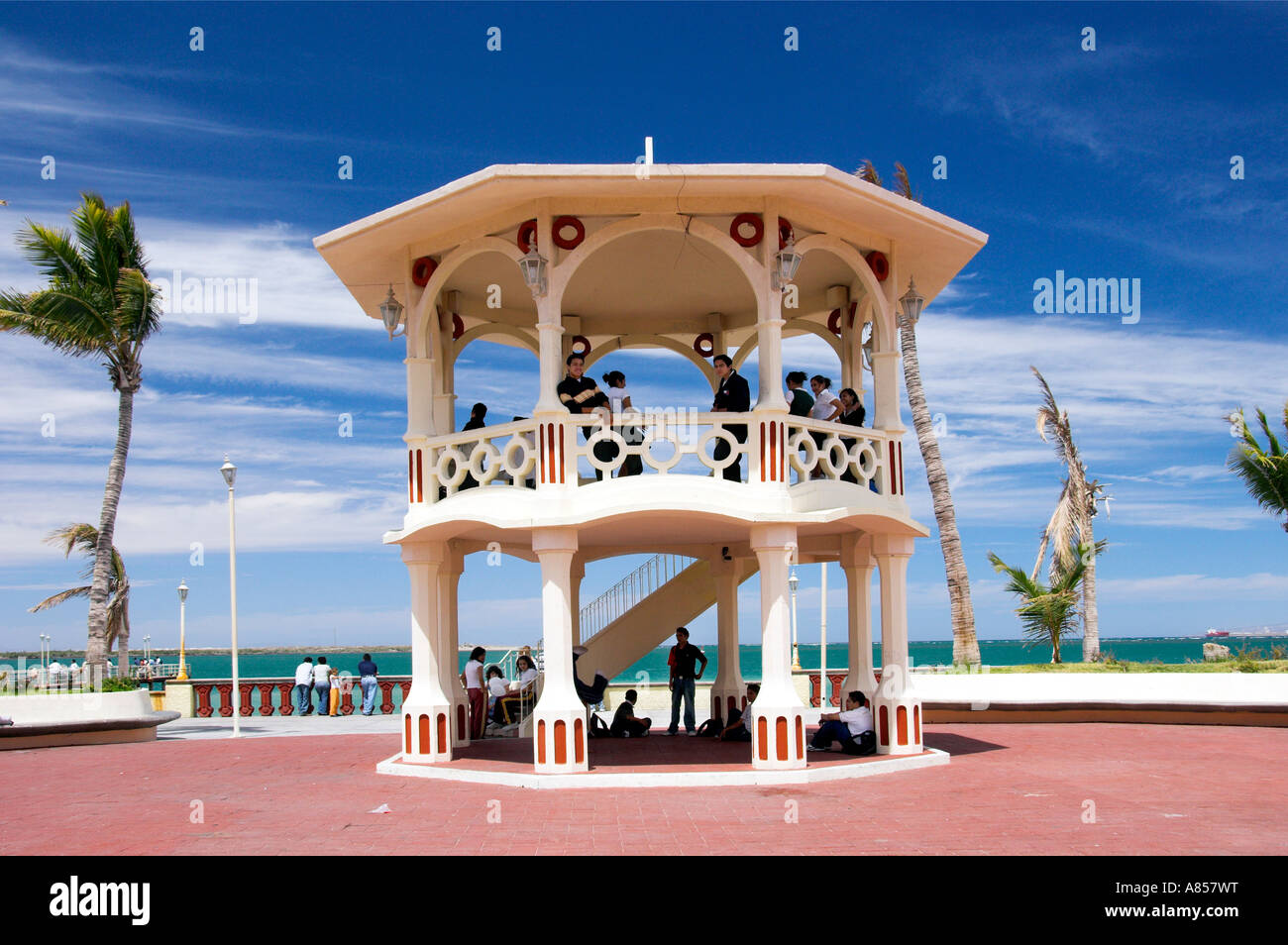 Young people enjoying the Queen's Pier along the malecon at La Paz Mexico Stock Photo