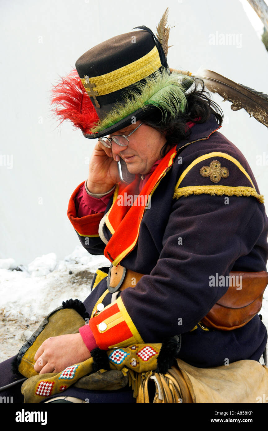 Earl in period costume using a cell phone at the Festival du Voyageur in  Winnipeg Manitoba Canada Stock Photo - Alamy
