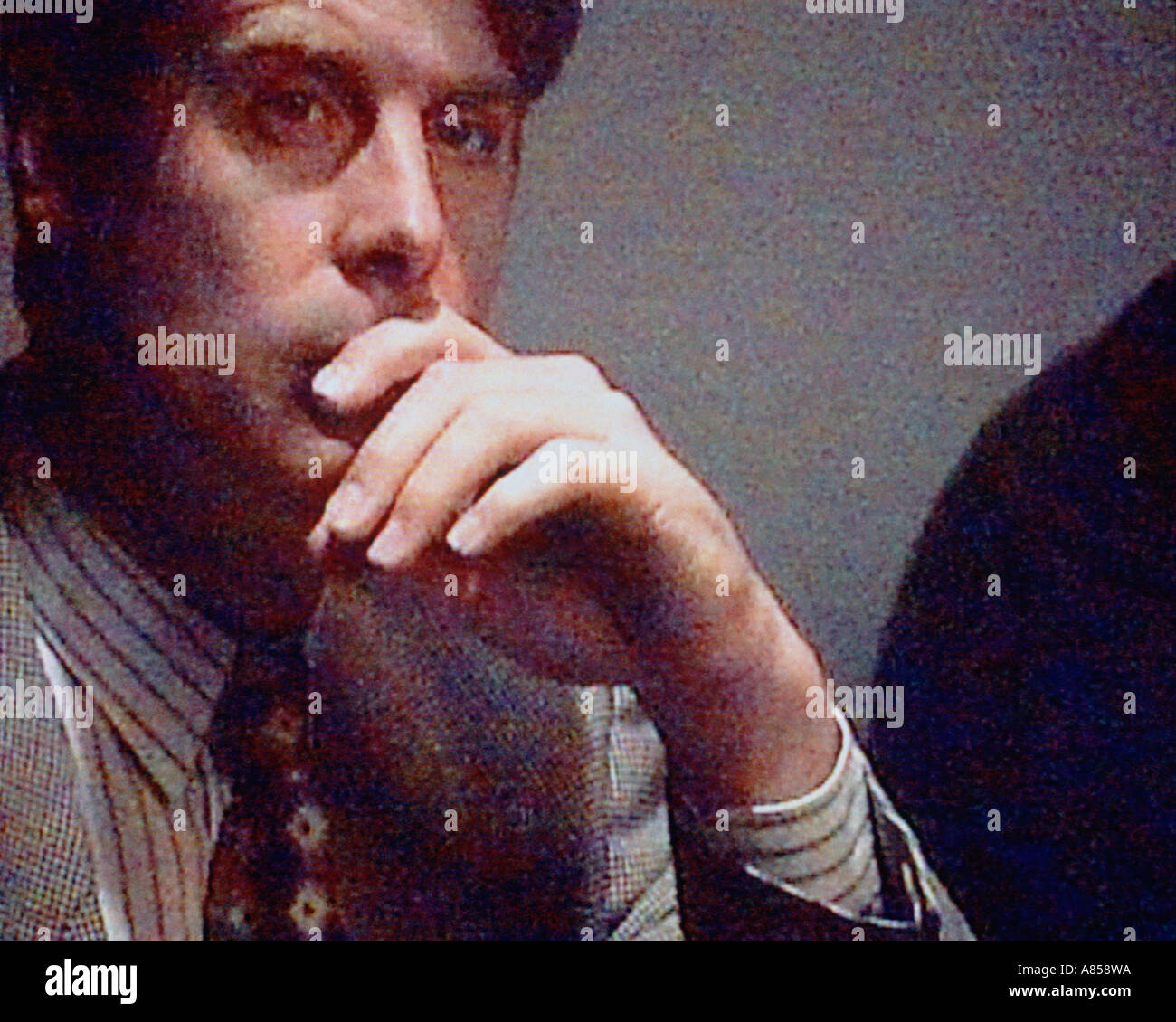 Close-up of young man thinking. Stock Photo