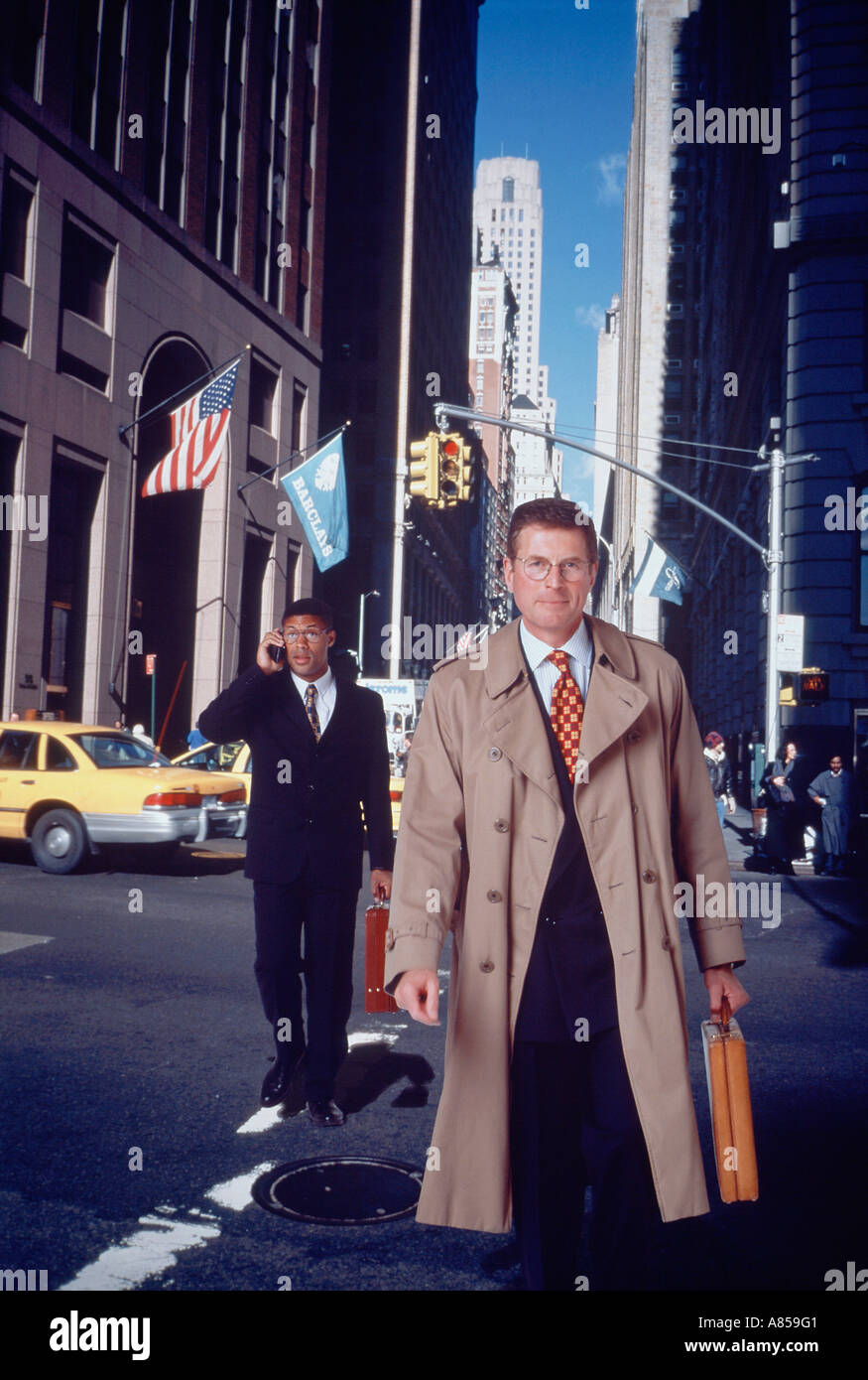 USA. New York city. Business men walking in the street Stock Photo Alamy