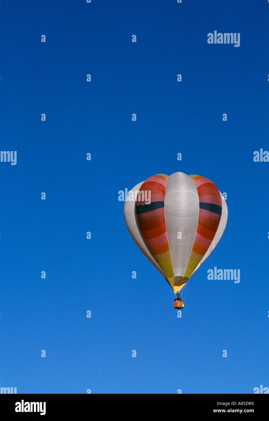 NM Albuquerque Balloon Fiesta Festival Single hot air balloon in blue sky Stock Photo