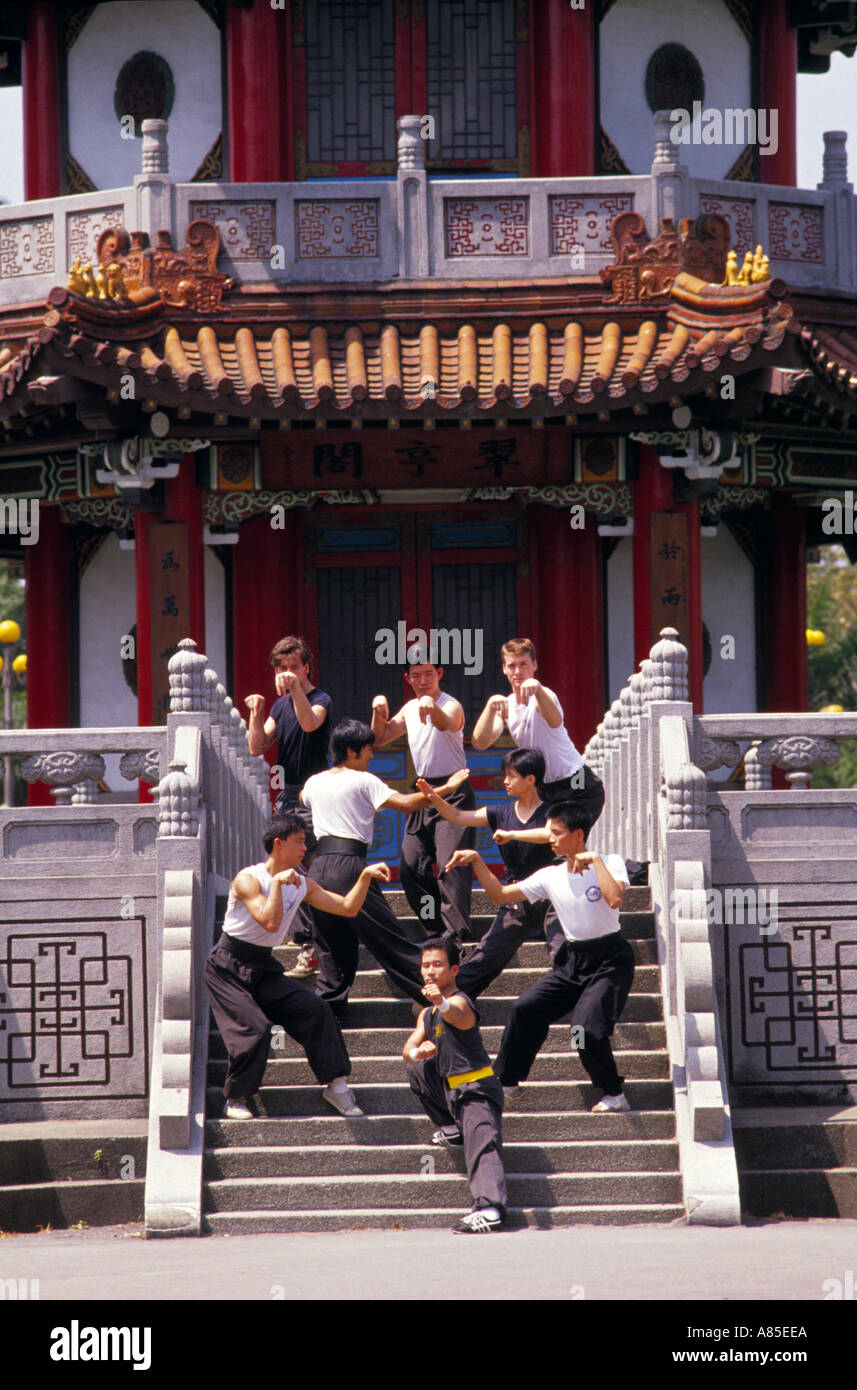Chinese Kung Fu master with learners performed in Taipei New park