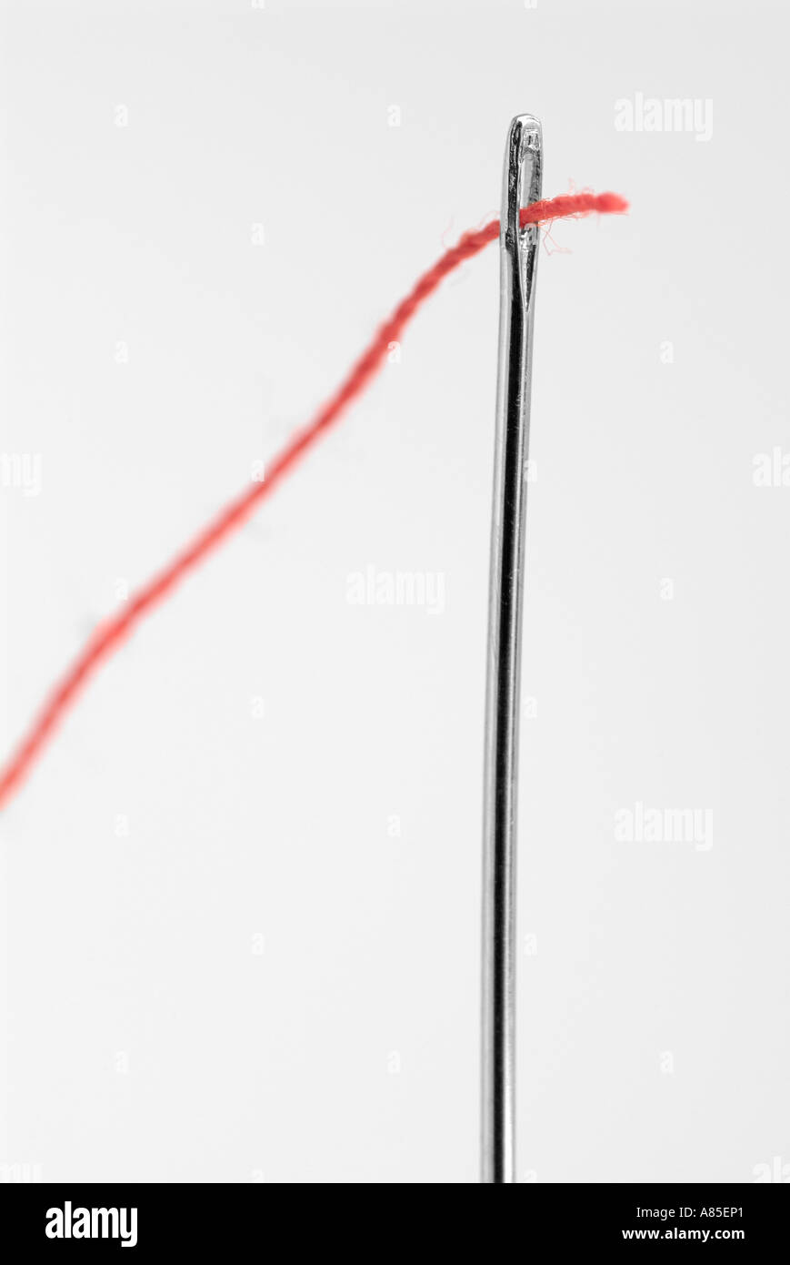 Extreme Close Up Of Threading A Needle Stock Photo Alamy