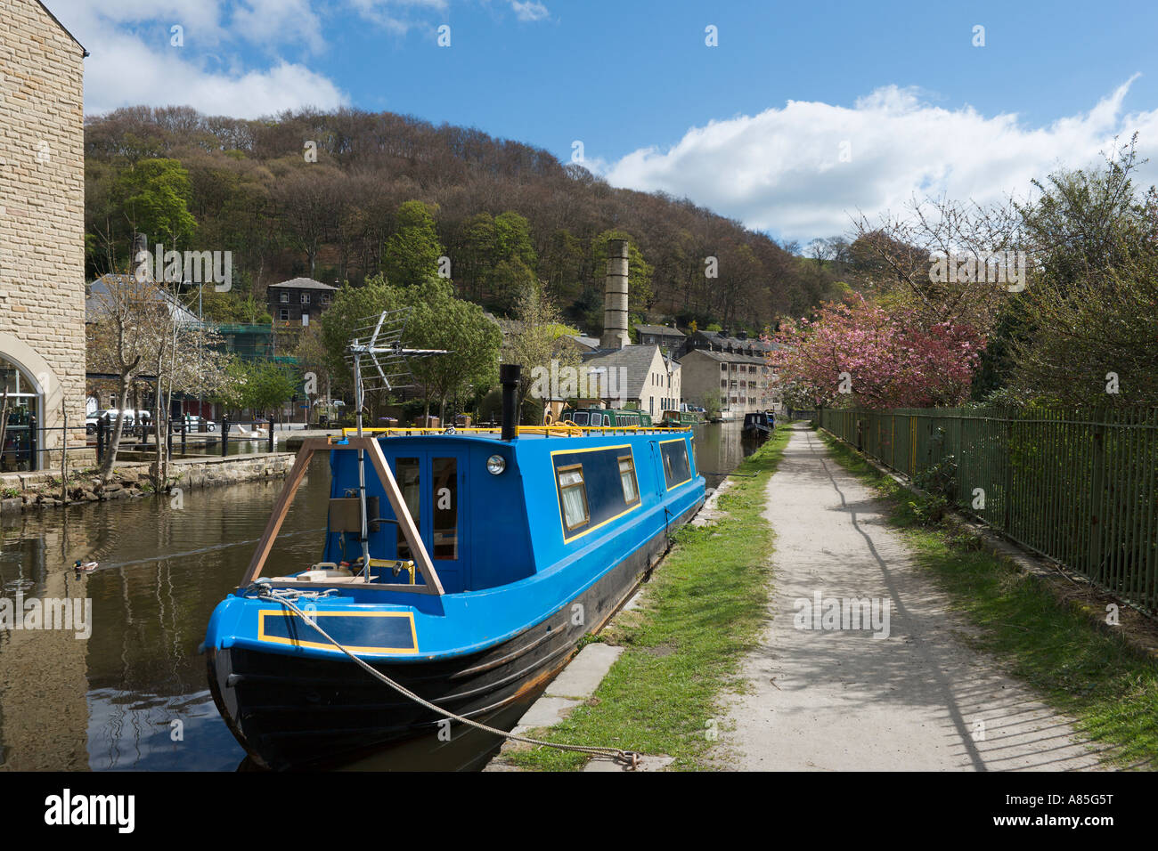 Narrow Boat on the Rochdale Canal in the town centre, Hebden Bridge, Calder Valley, West Yorkshire, England, UK Stock Photo