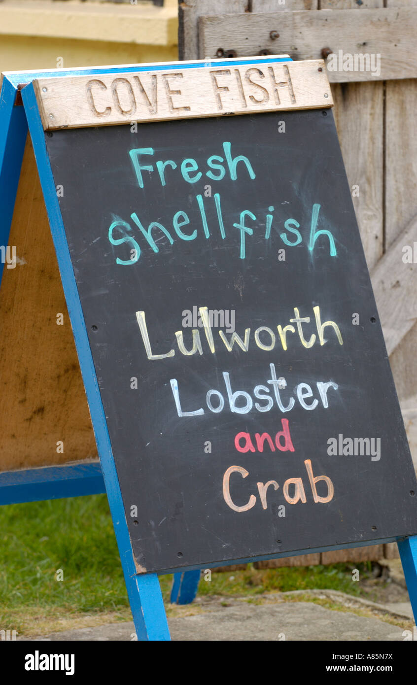 FRESH SHELLFISH sign at Lulworth Cove Dorset England UK Stock Photo