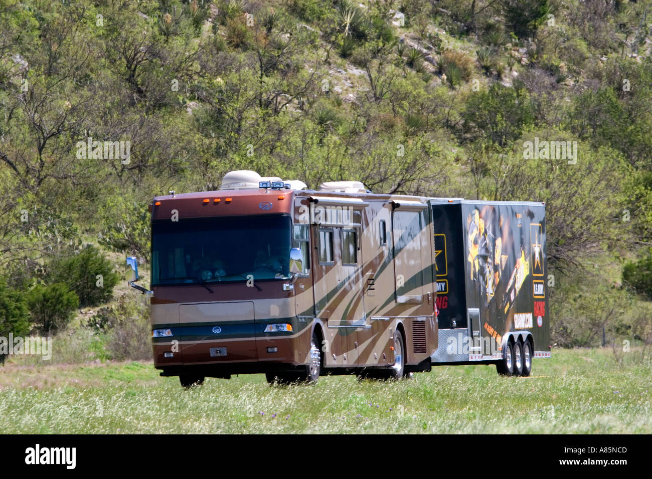 A recreational vehicle pulling a trailer on Interstate 10 in west Texas