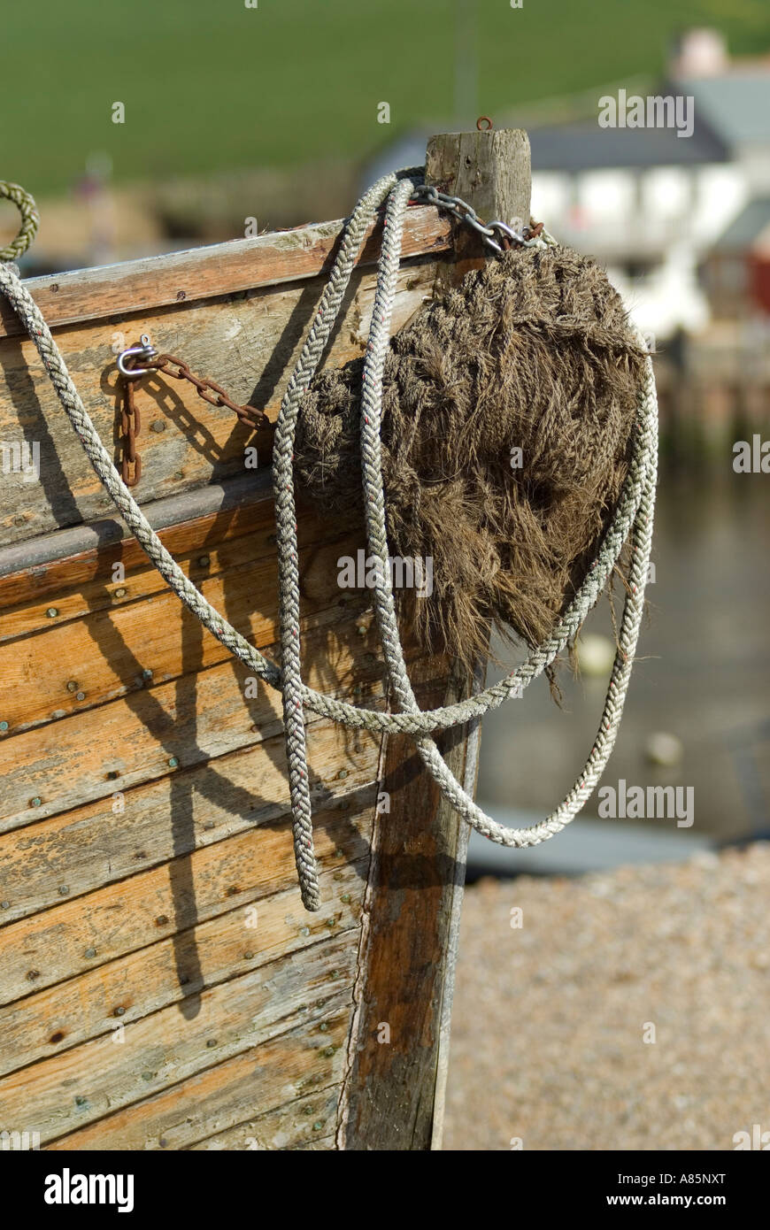 Axemouth Devon March 2007, detail of boat tied up on shore on estuary