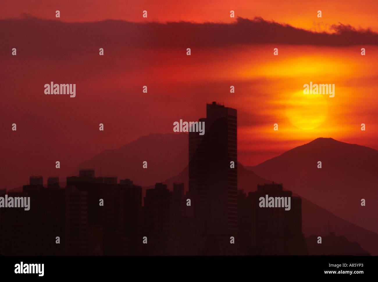Sunset above the hills and skyscrapers of Hong Kong Stock Photo - Alamy