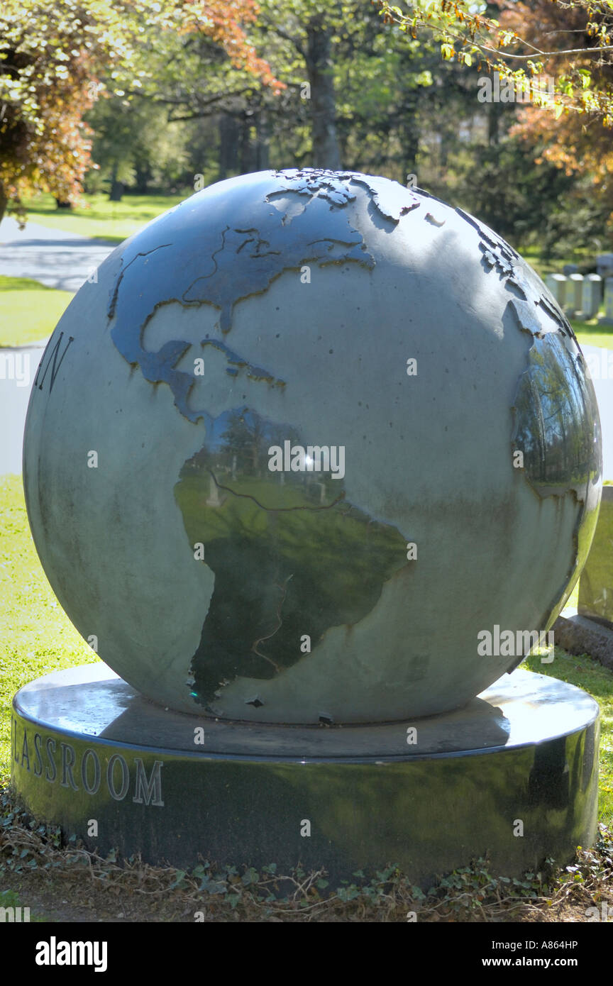 Sculpture of the planet earth that is located in the Lexington Cemetery in Lexington Kentucky USA Stock Photo