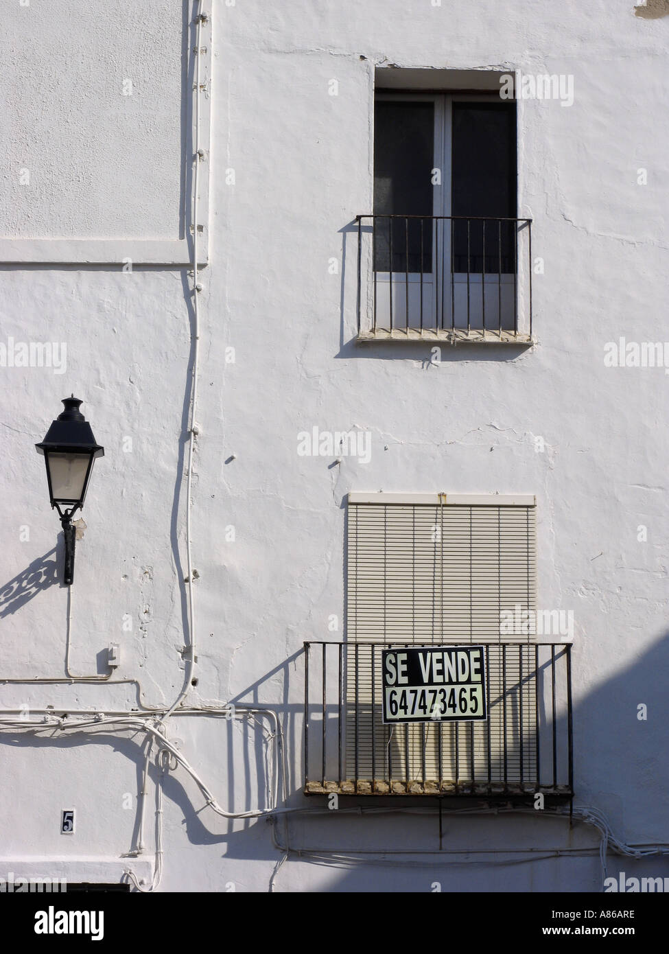 Typical white hous in a spanish village for sale Stock Photo