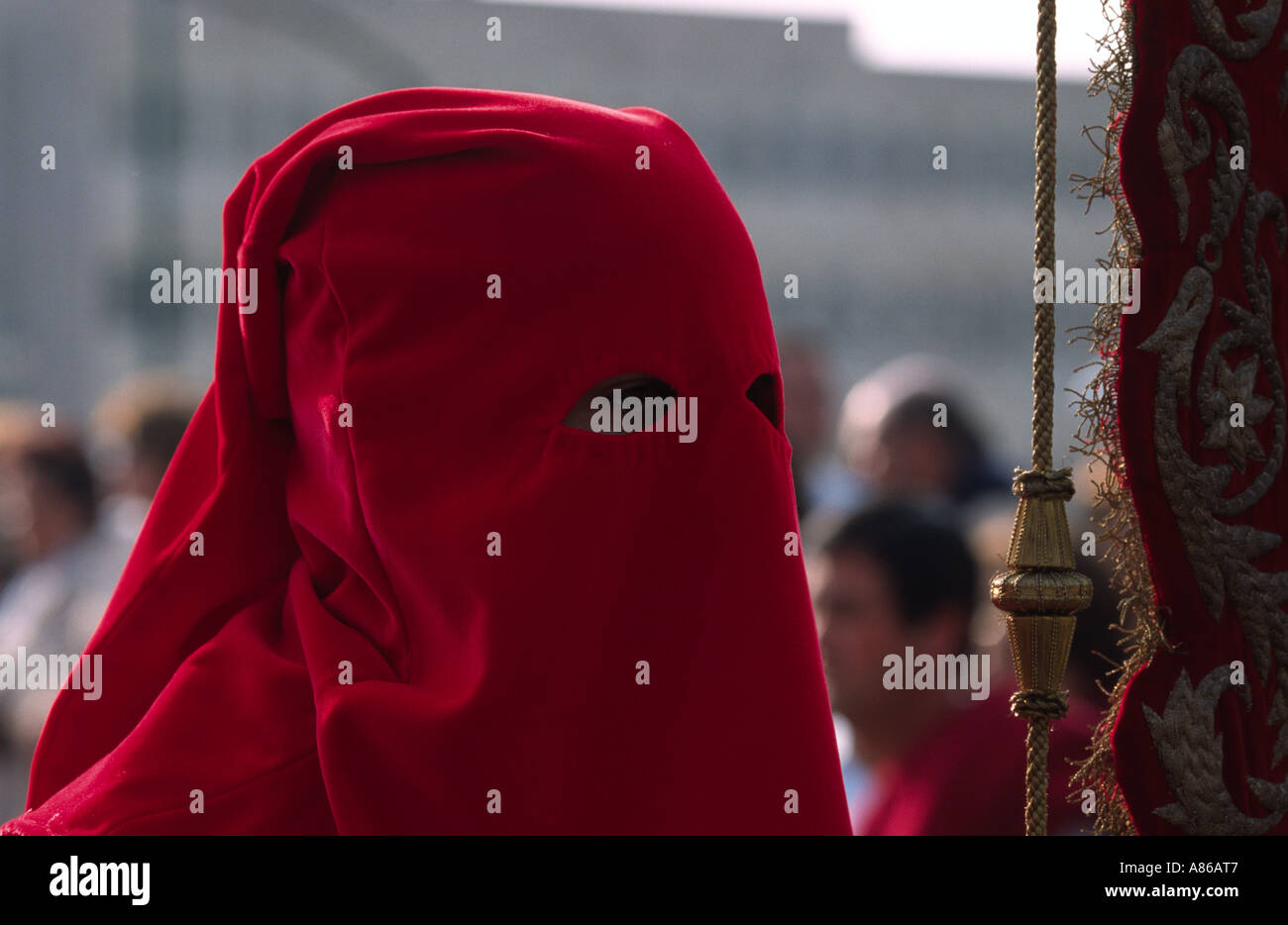 Close up of red hooded man in Easter procession in Spain Stock Photo