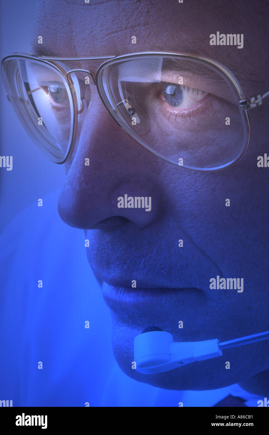 male switchboard operator with headset Stock Photo - Alamy