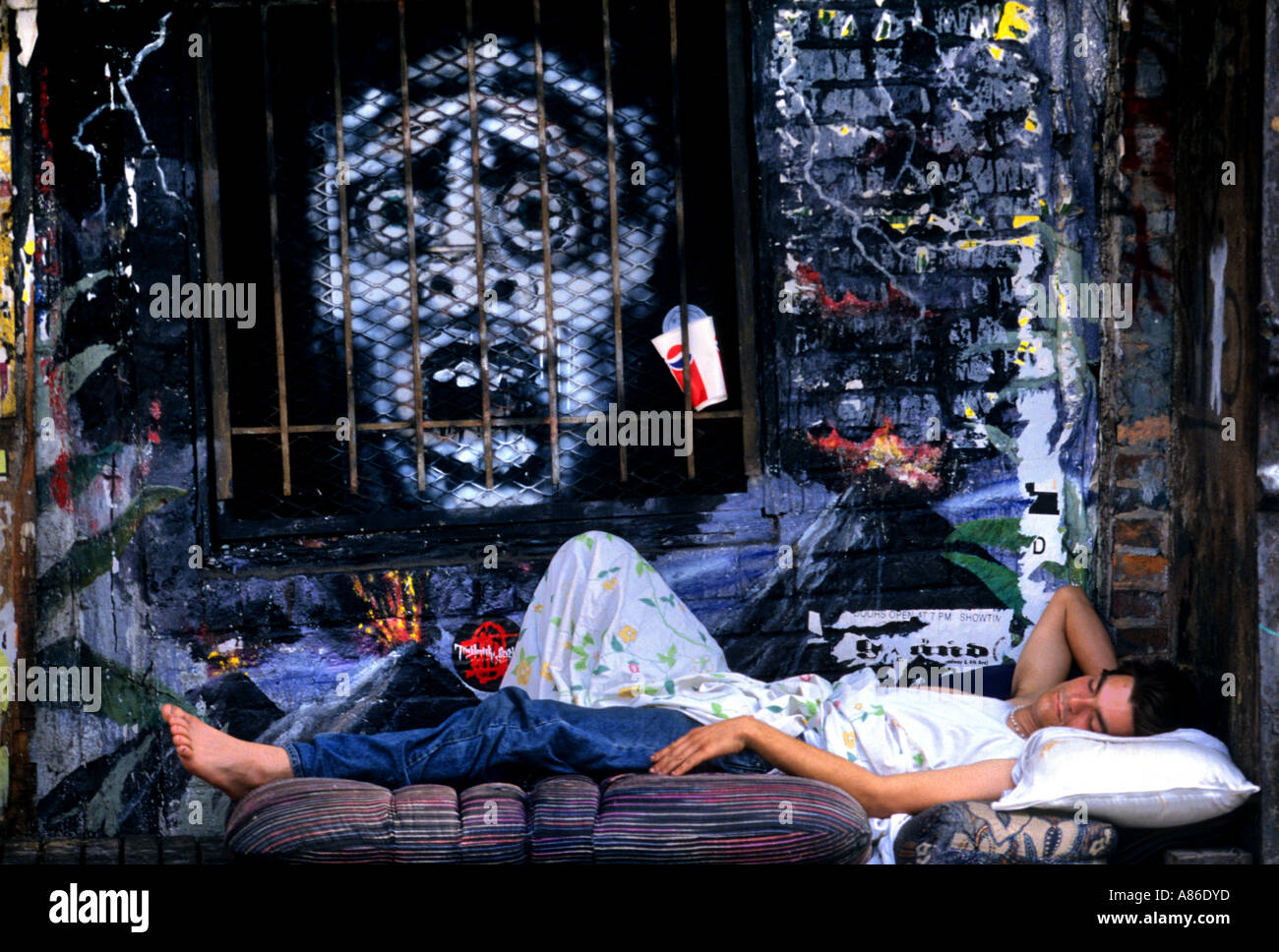 New York Manhattan Village East Greenwich sleeping man Stock Photo - Alamy