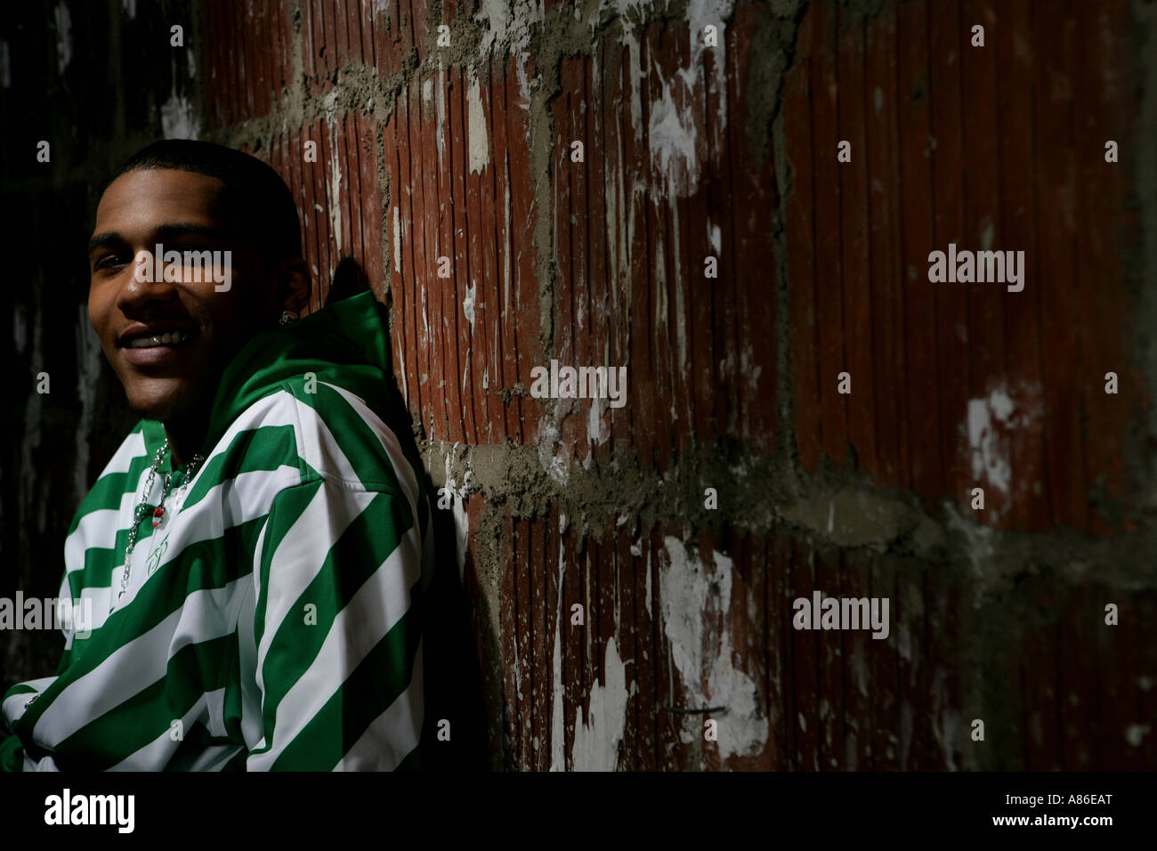 Young man smiling at camera Stock Photo - Alamy